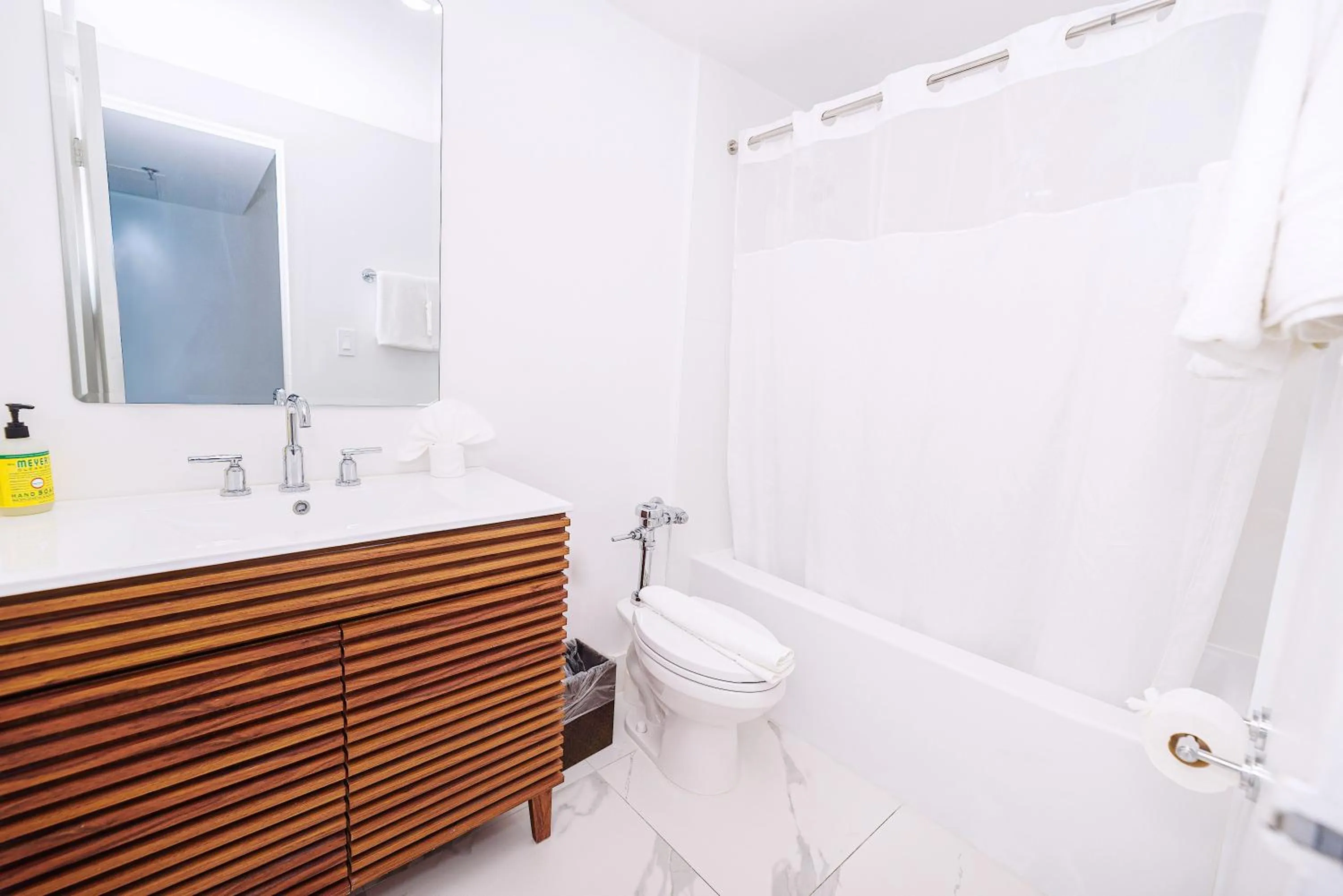 Shower in SeaStays Apartments