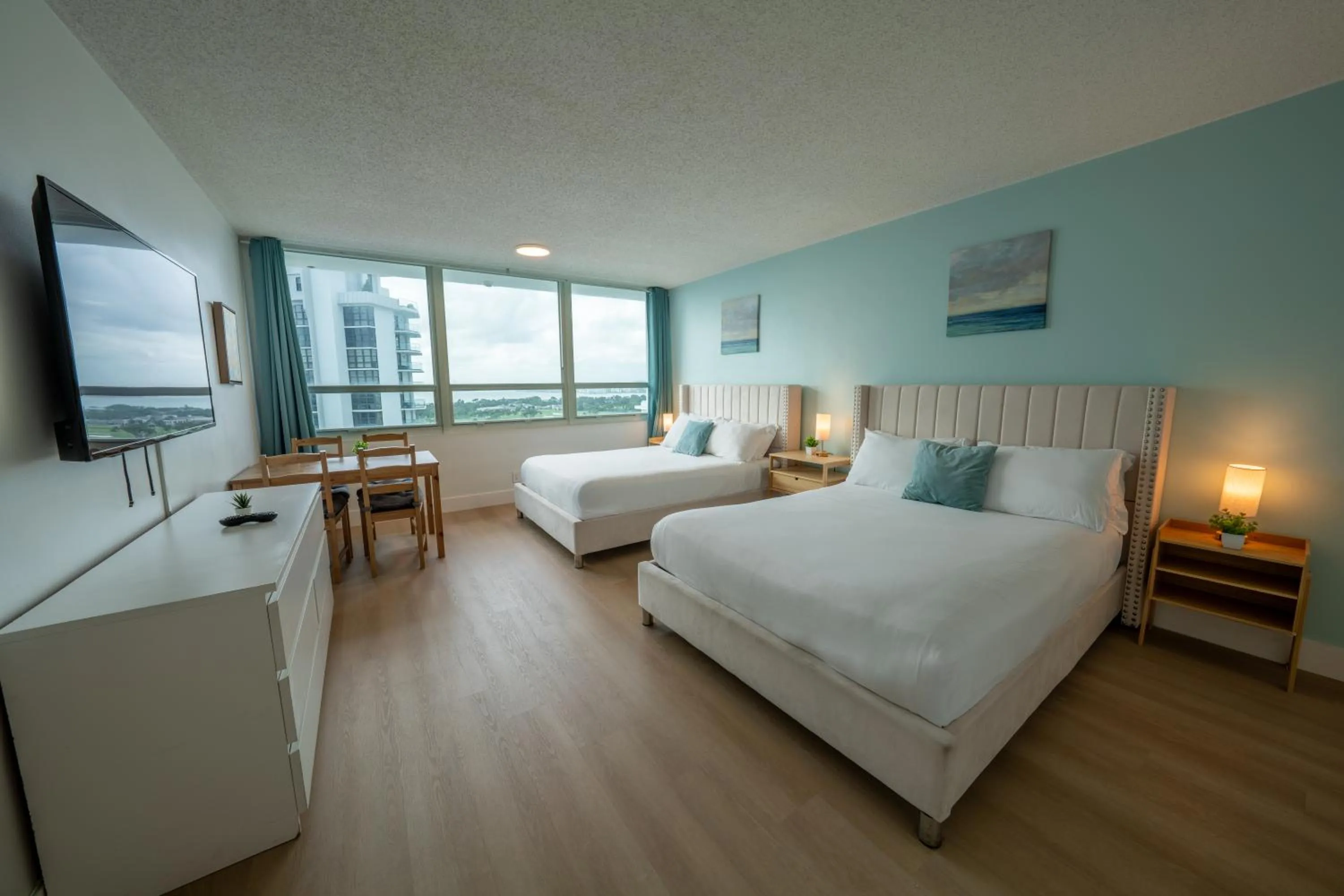 Bed in SeaStays Apartments