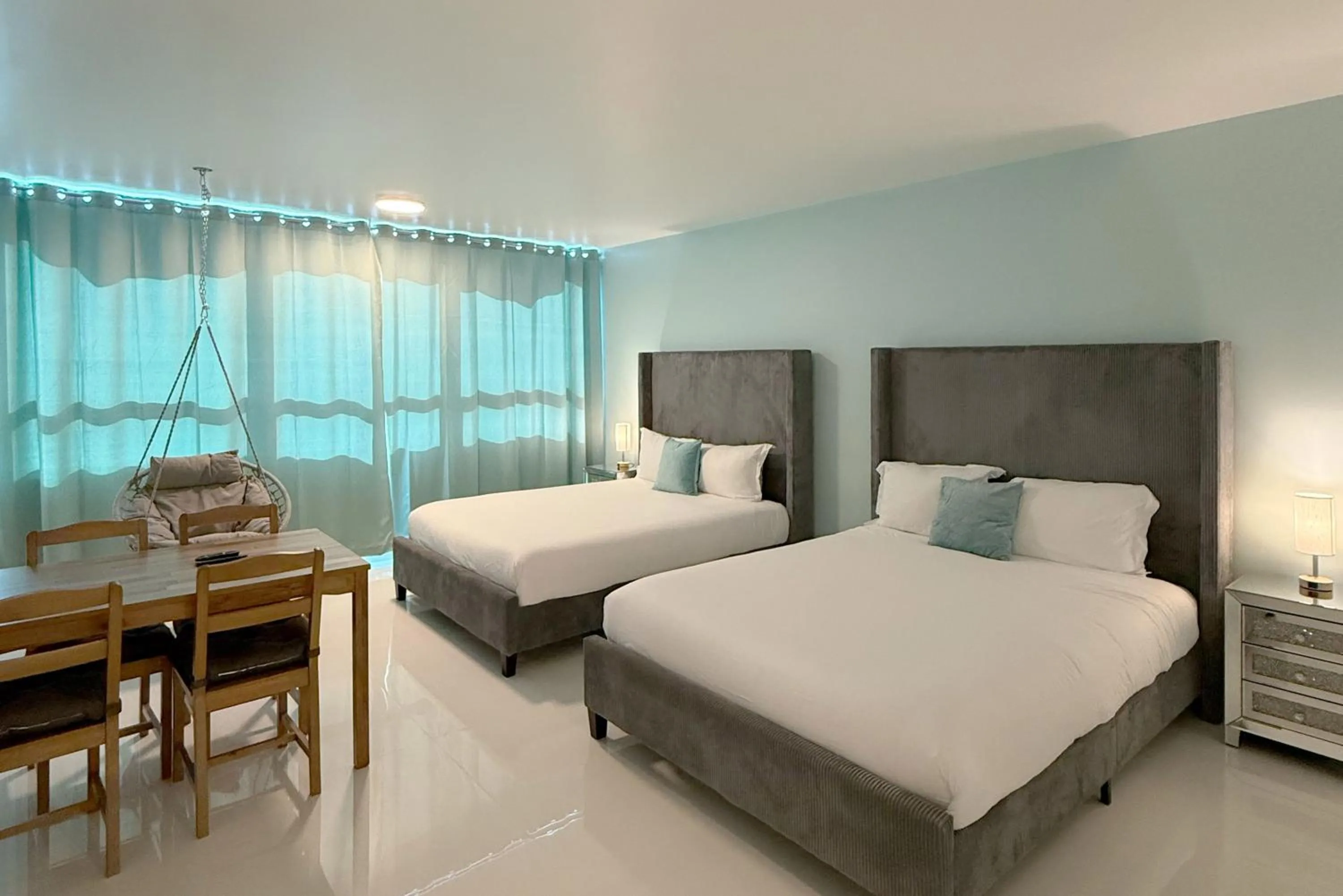 Bed in SeaStays Apartments