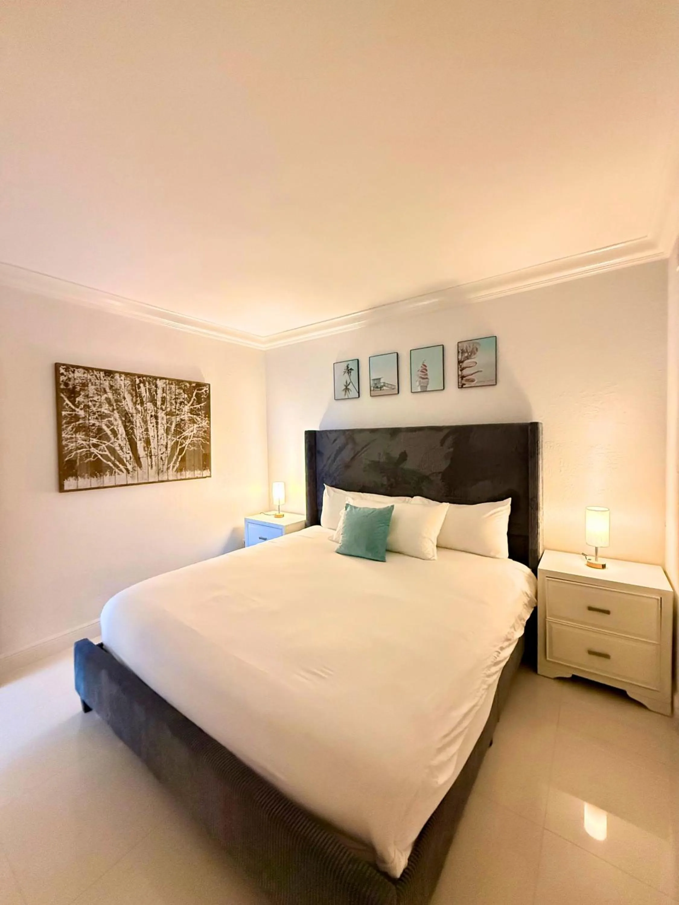 Bed in SeaStays Apartments