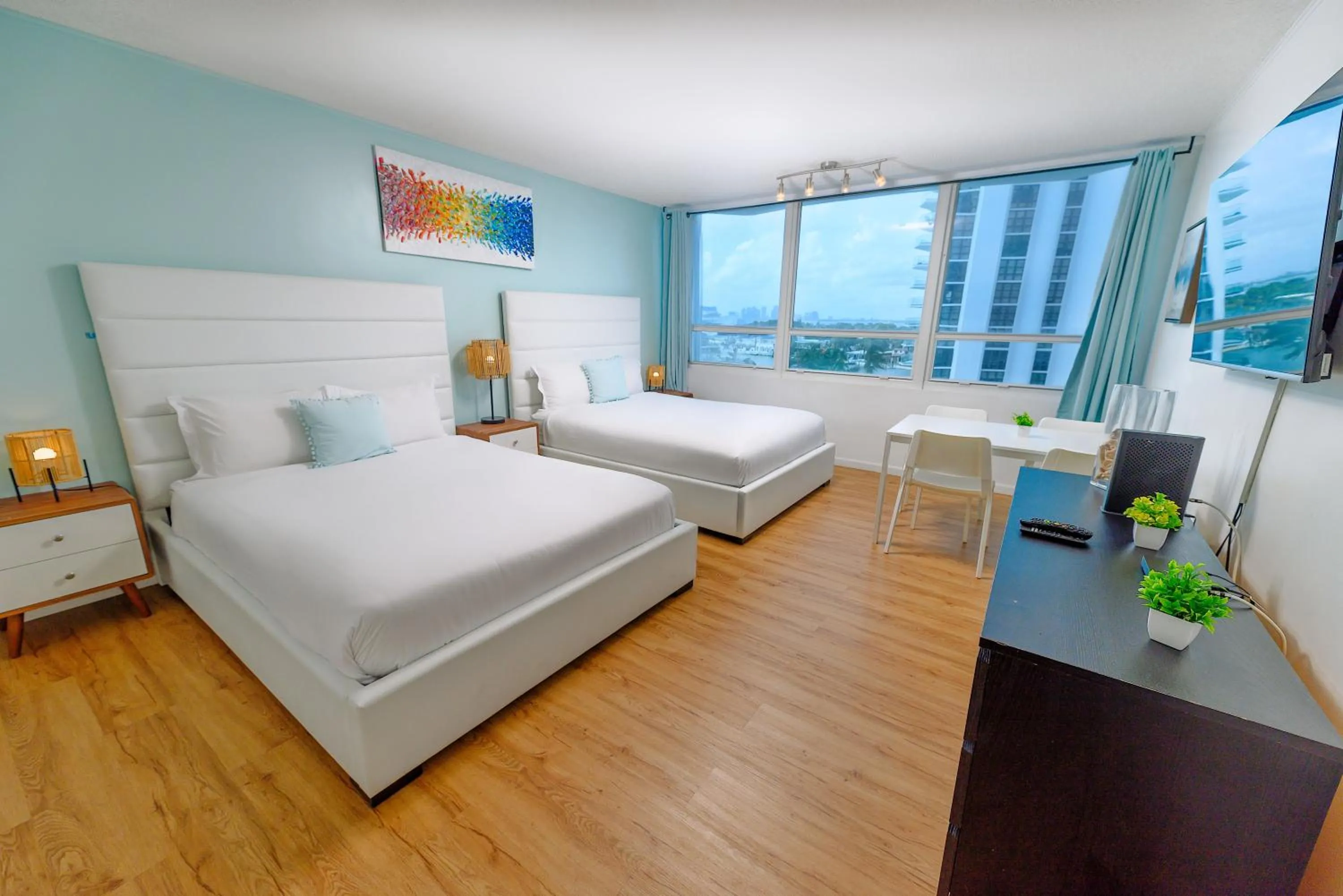 Bed in SeaStays Apartments