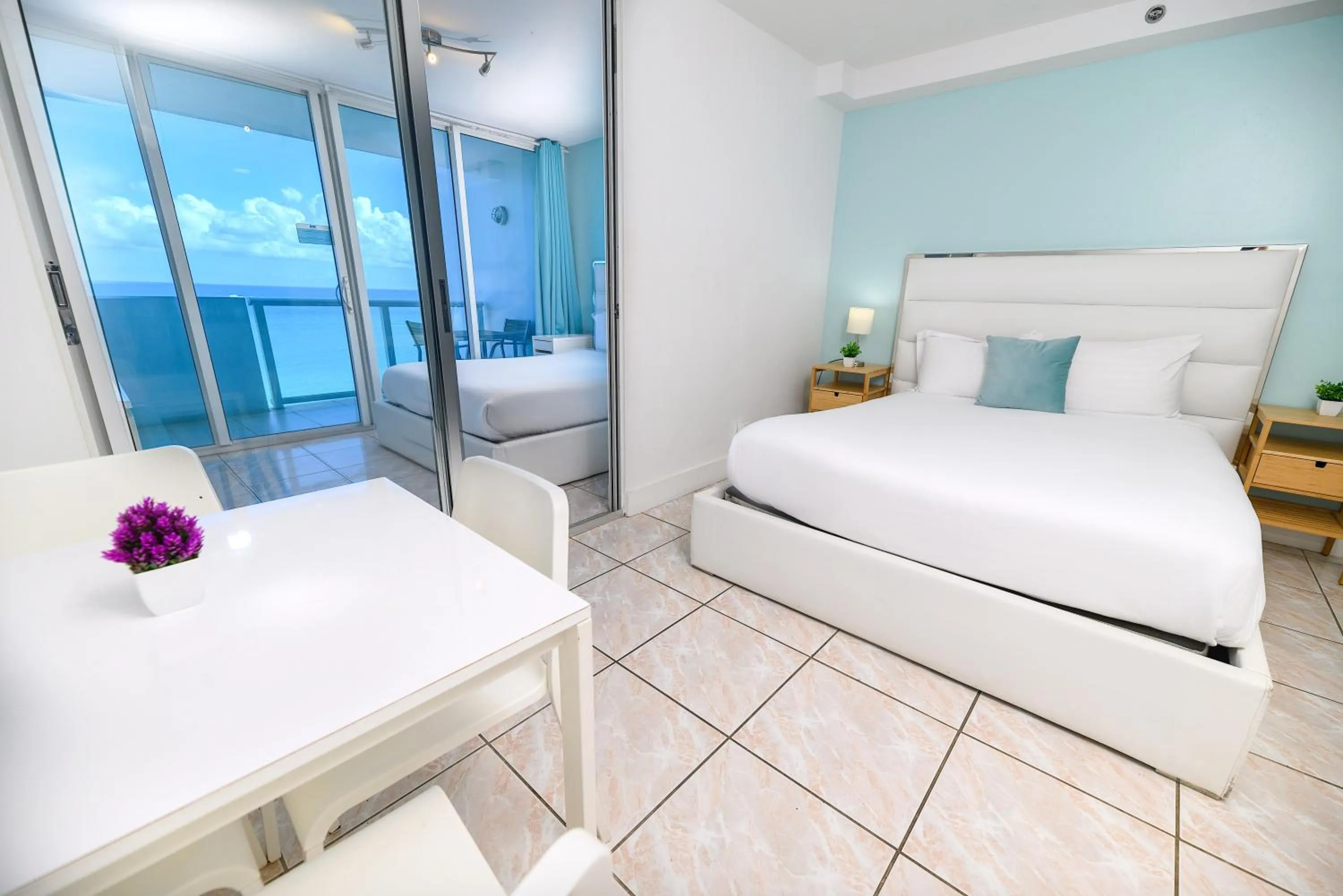 Bed in SeaStays Apartments