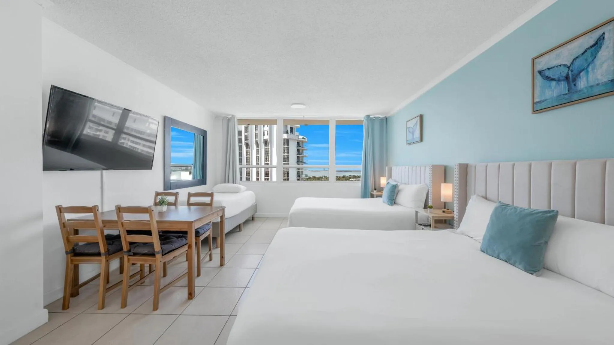 Bed in SeaStays Apartments