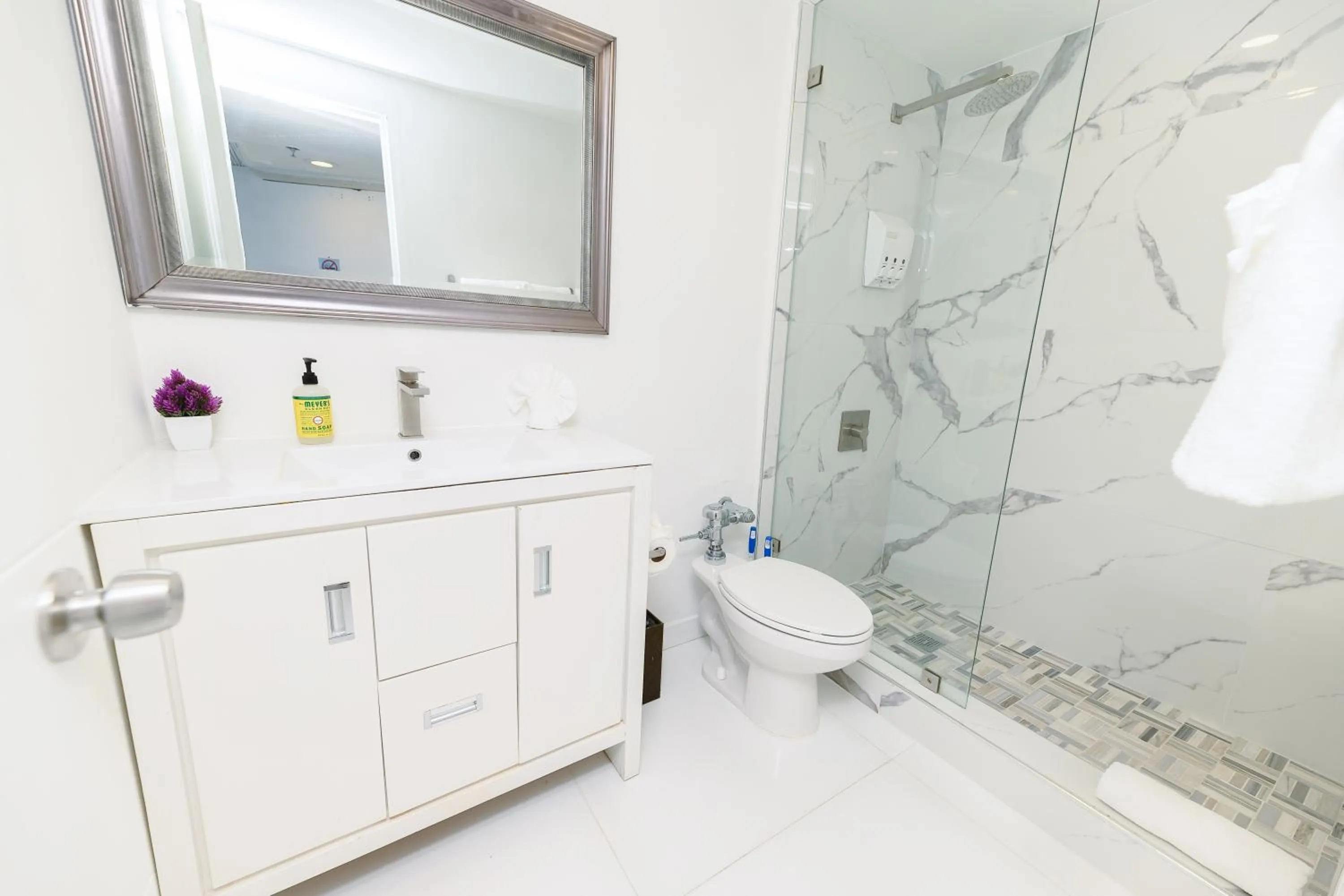 Shower in SeaStays Apartments