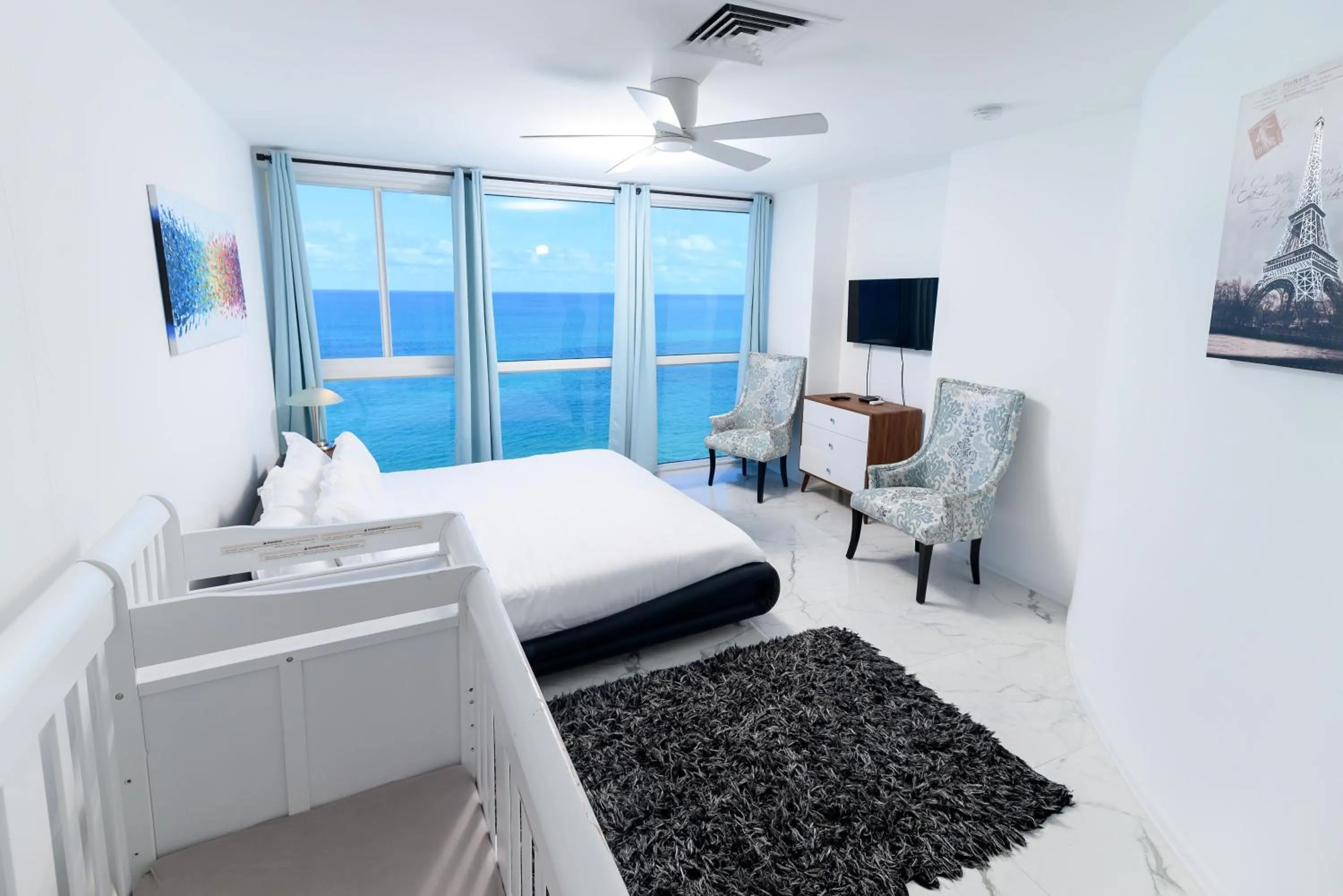 Bed in SeaStays Apartments