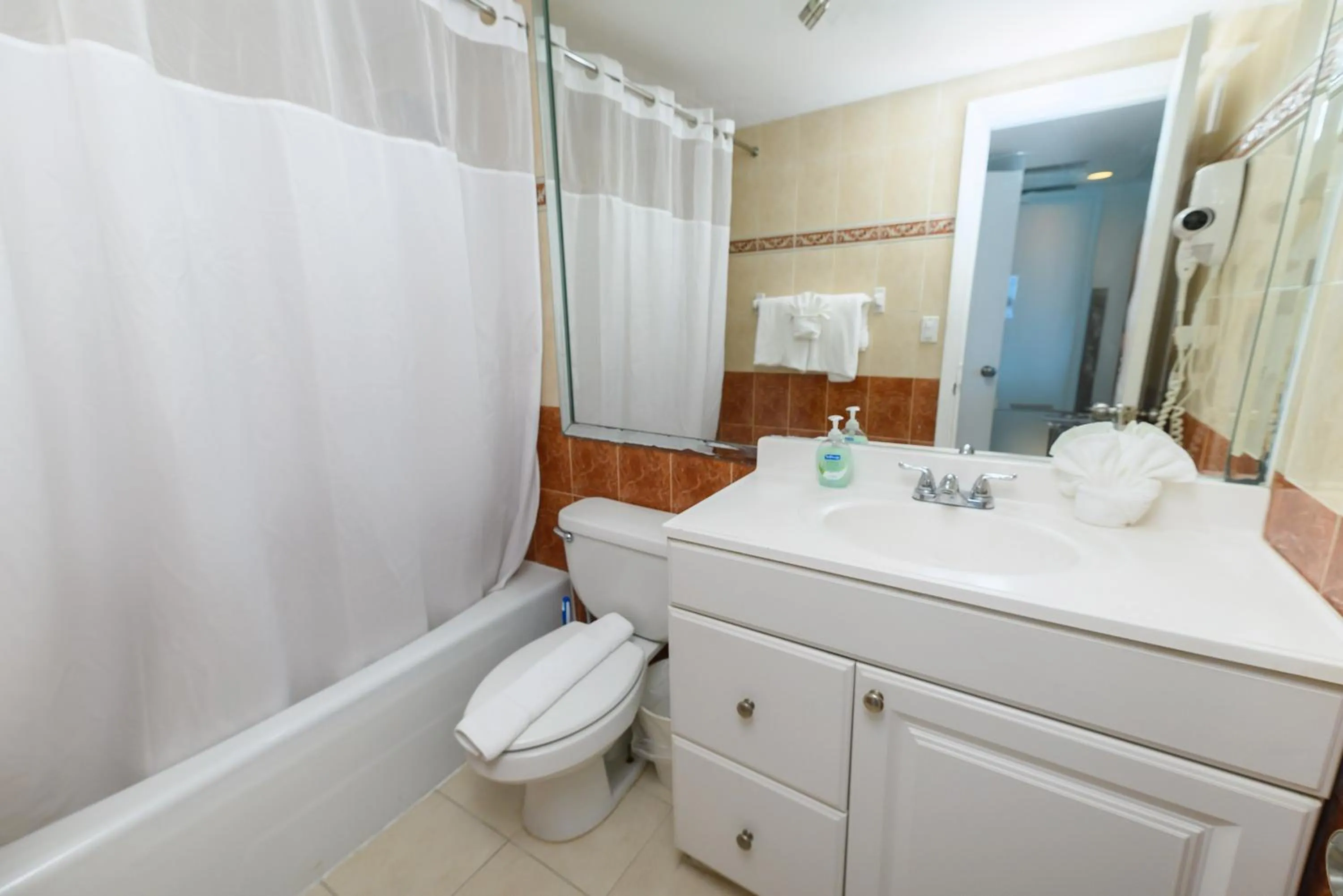 Shower in SeaStays Apartments