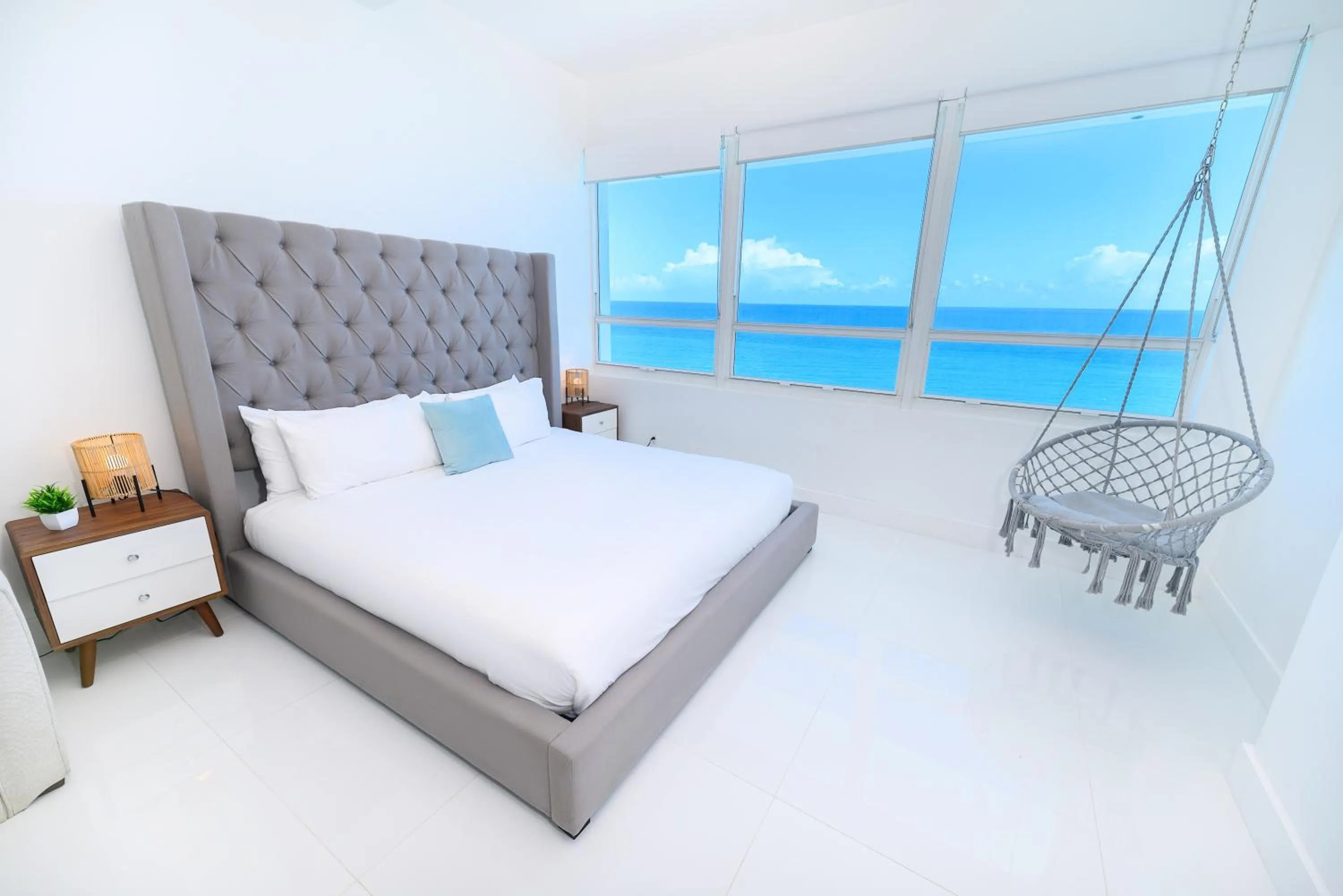 Bed in SeaStays Apartments