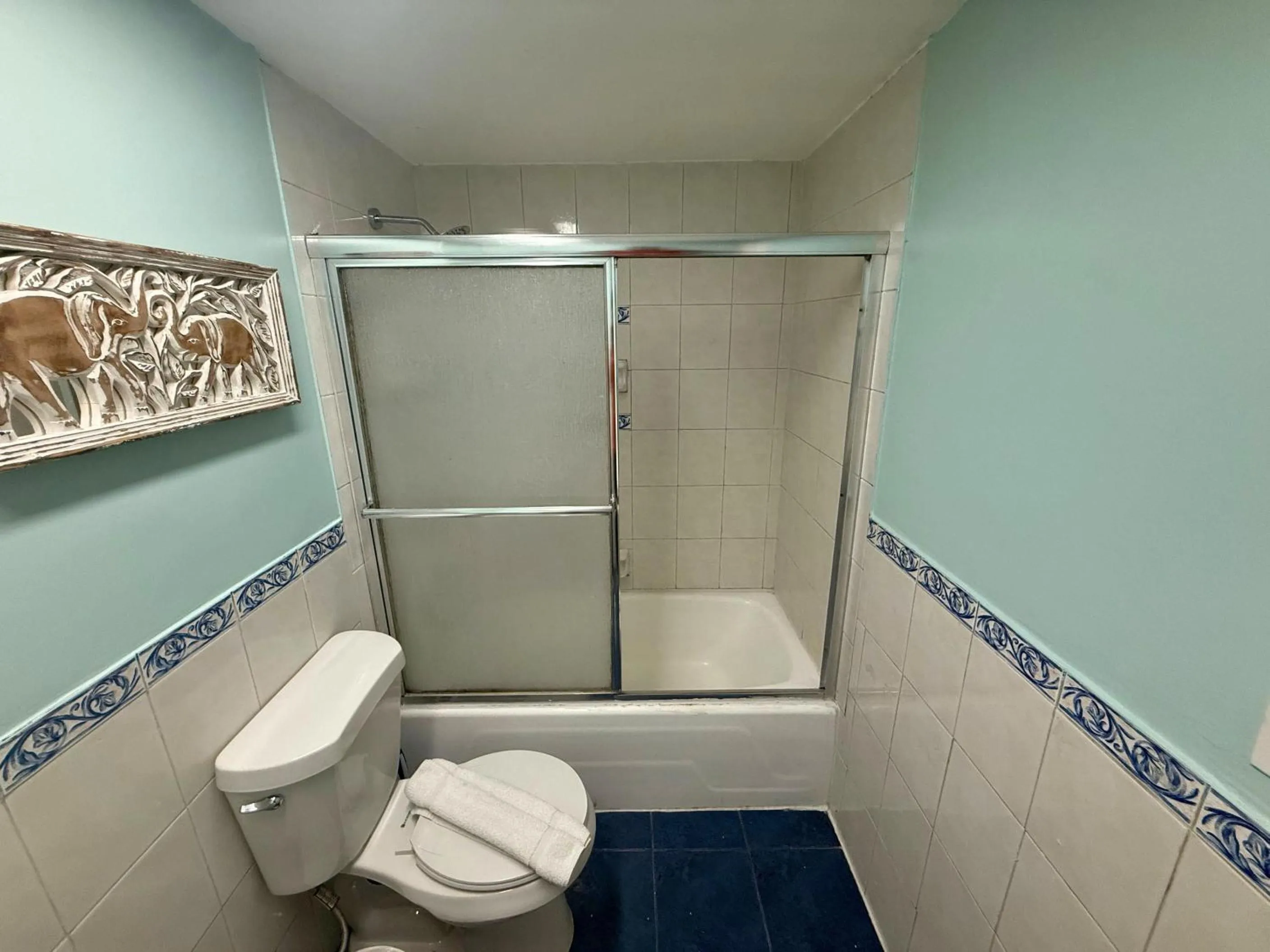 Shower in SeaStays Apartments