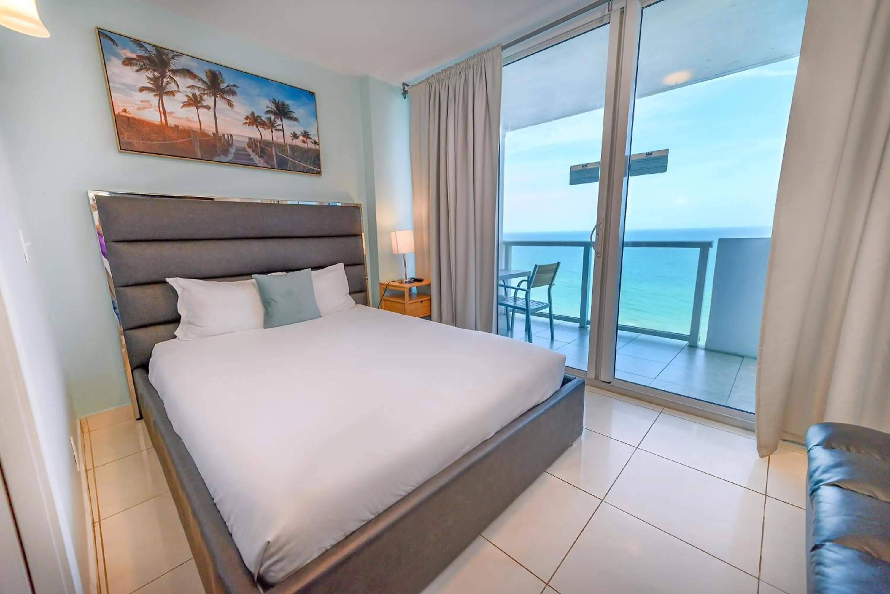 Bed in SeaStays Apartments