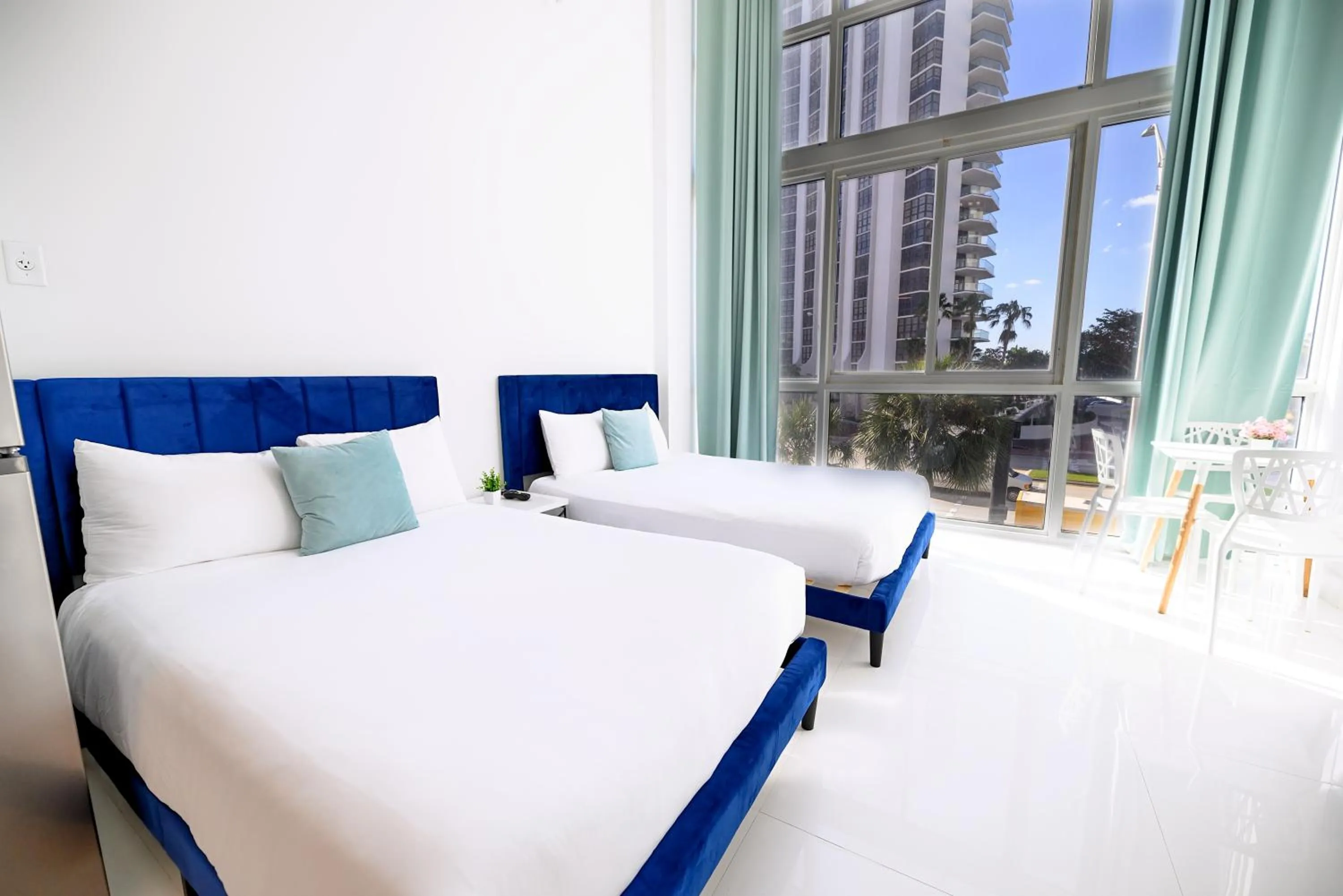 Bed in SeaStays Apartments