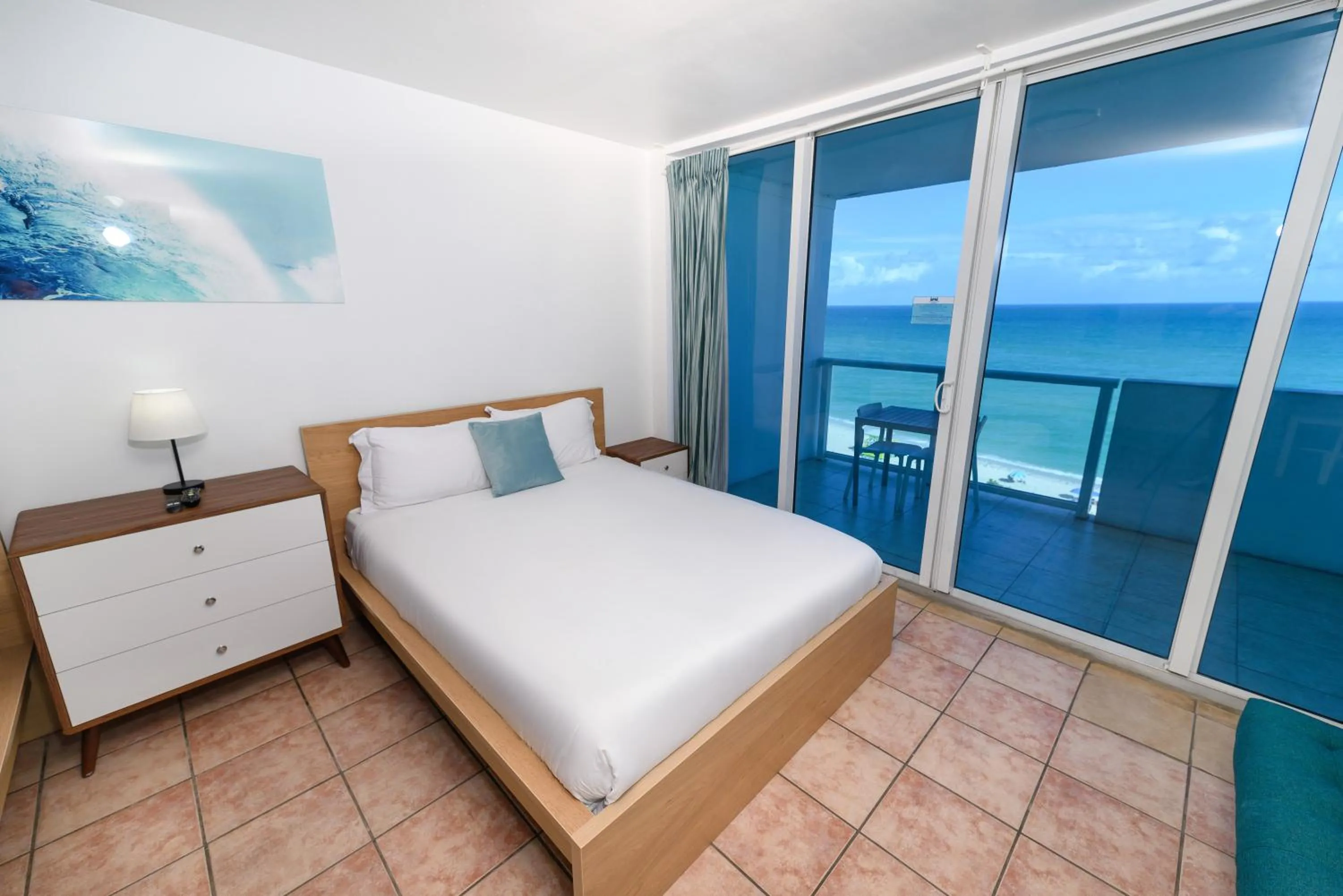 Bed in SeaStays Apartments