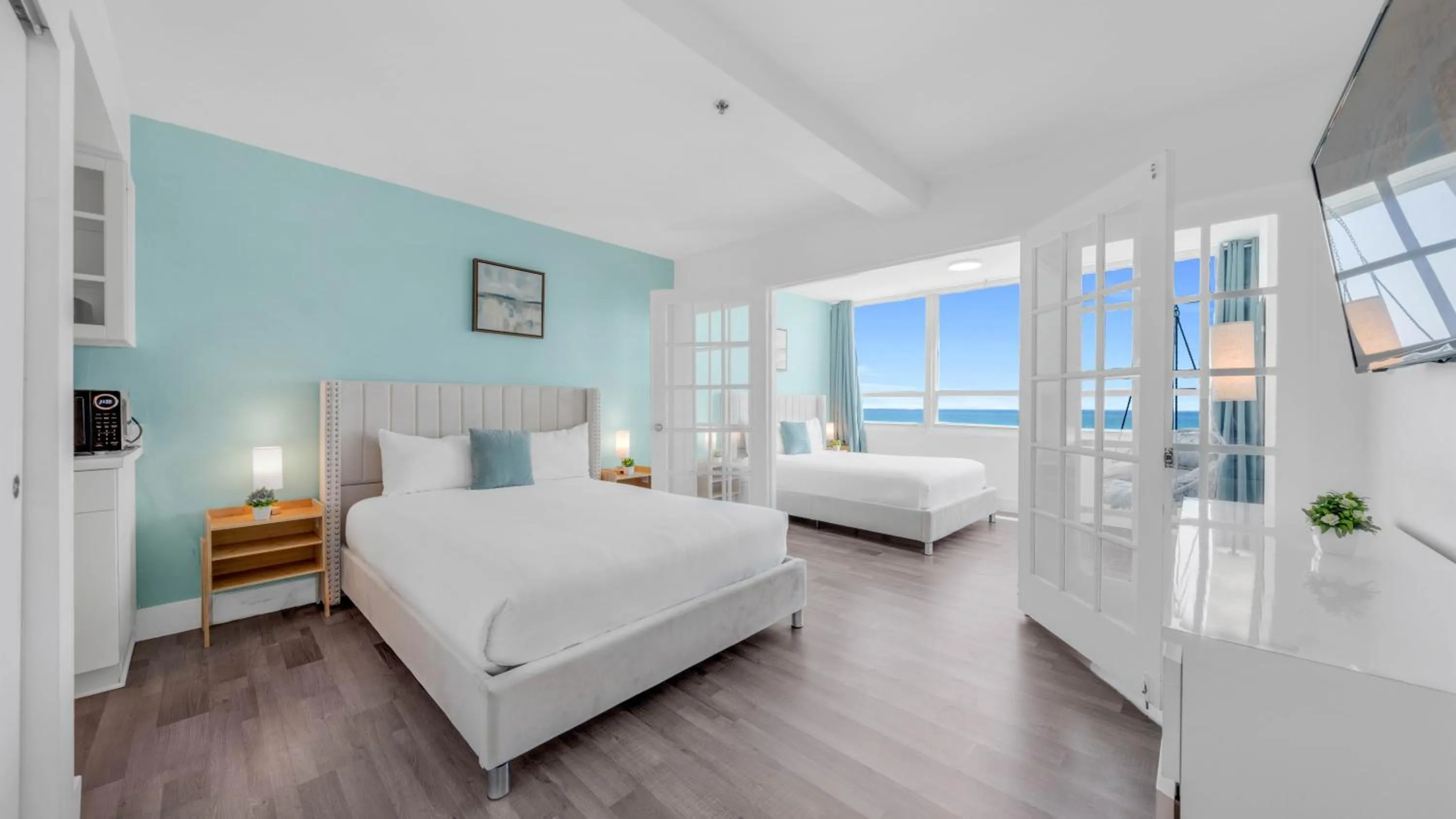 Bed in SeaStays Apartments