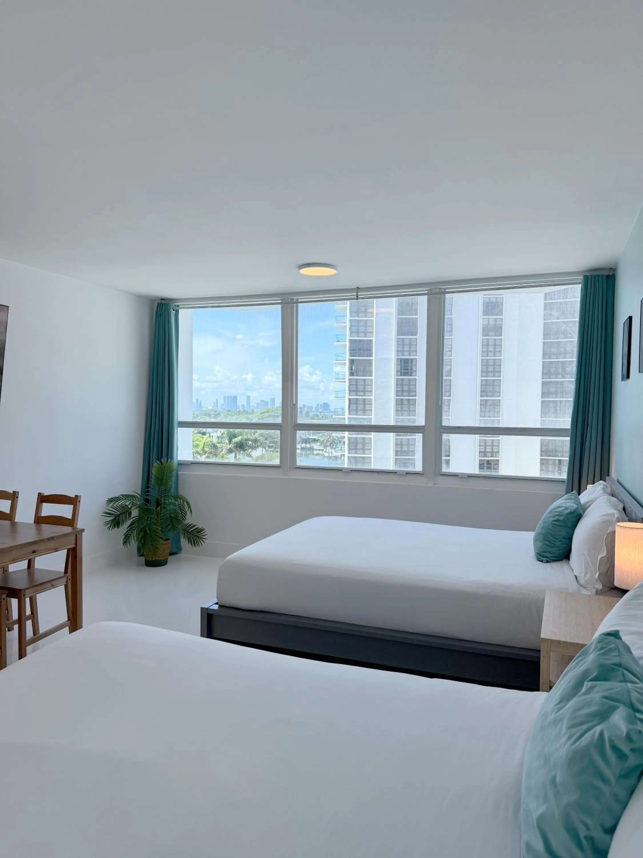 Bed in SeaStays Apartments