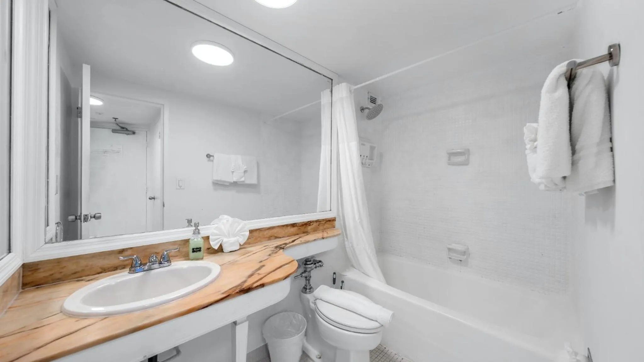 Shower in SeaStays Apartments