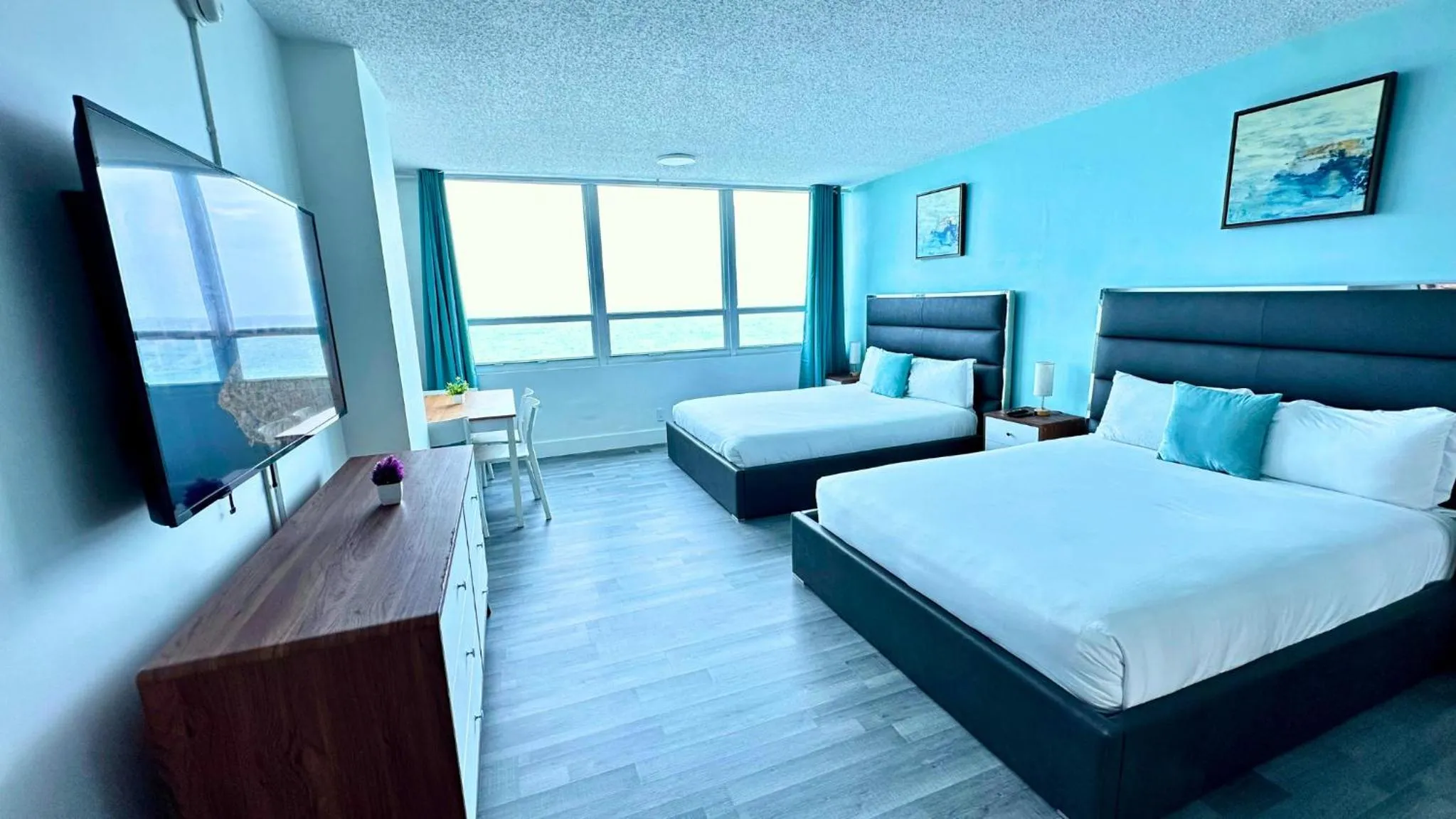 Bed in SeaStays Apartments