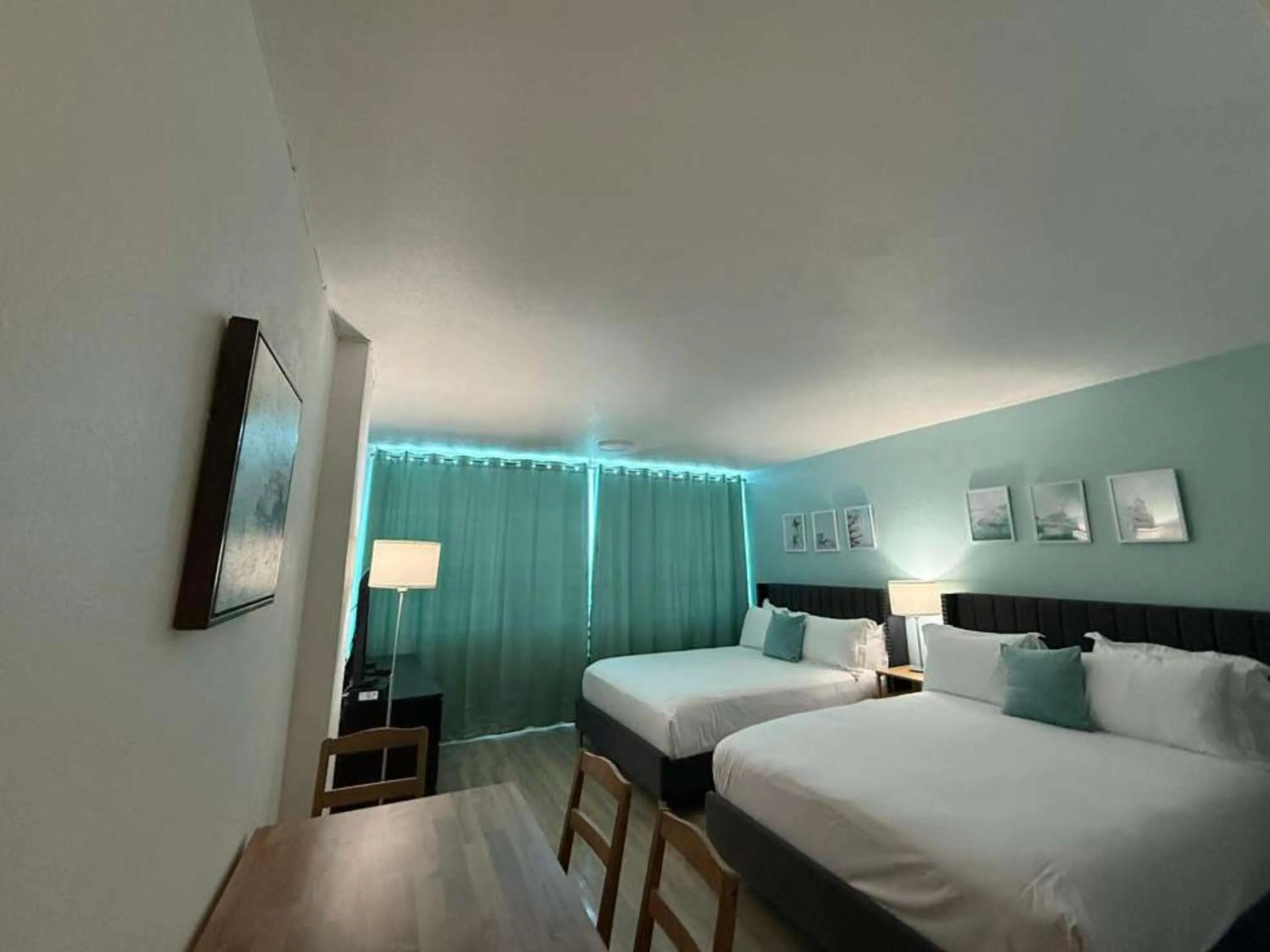 Bed in SeaStays Apartments