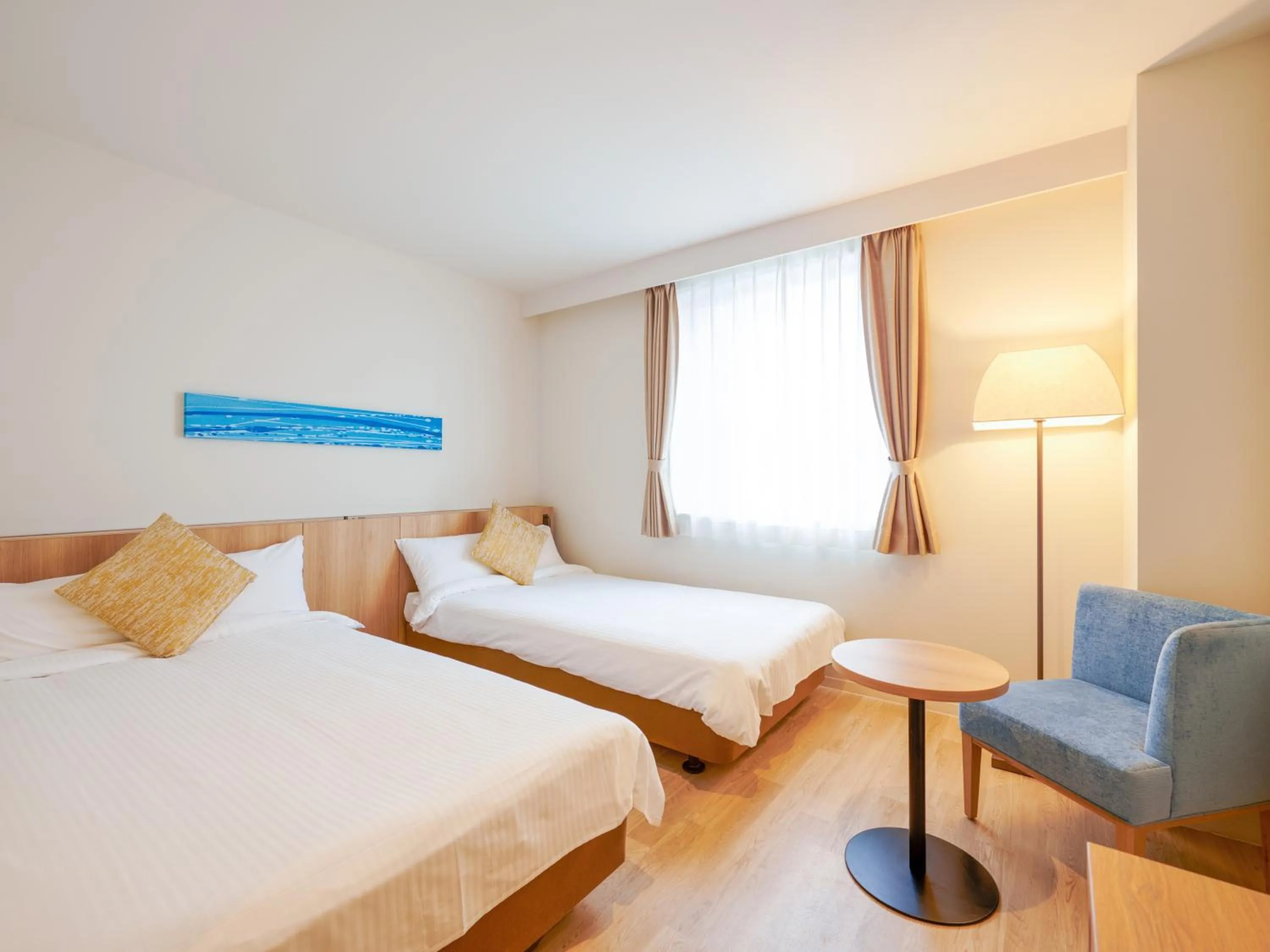 Bed in HOTEL SEABREEZE CORAL