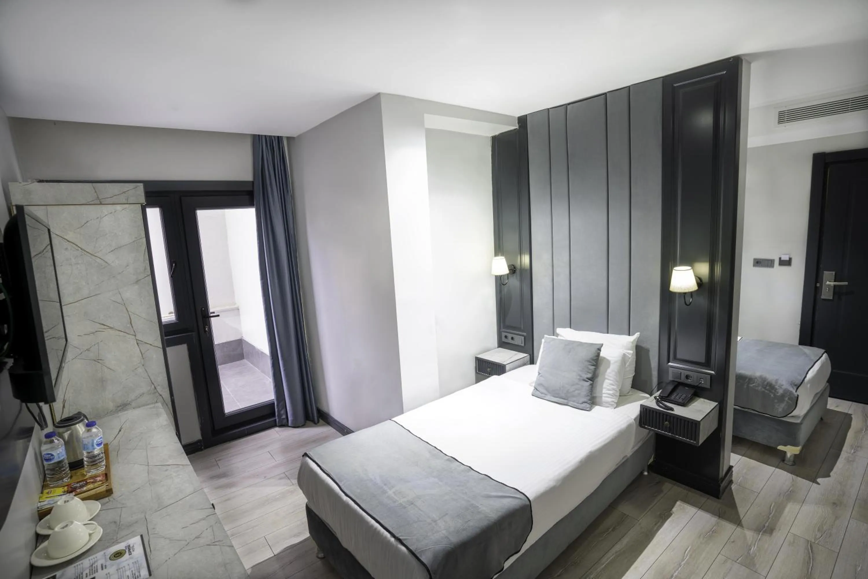 Bed in Express Plus Hotel