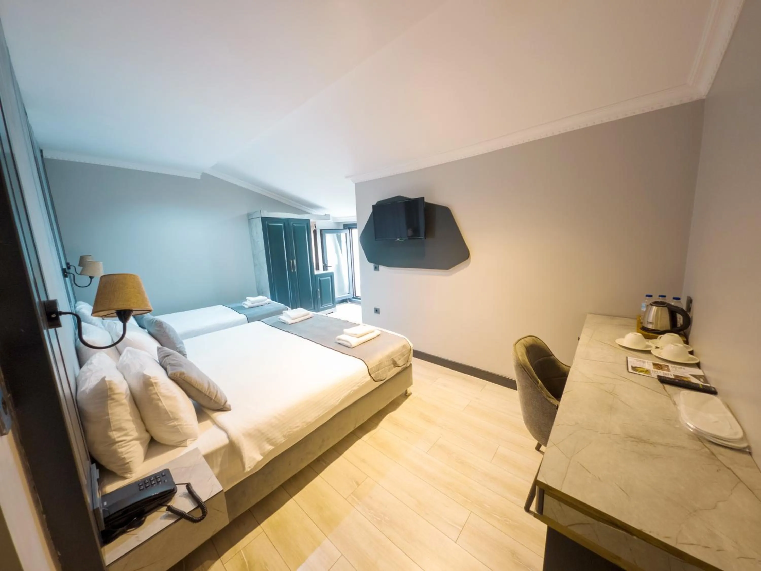 Bed in Express Plus Hotel