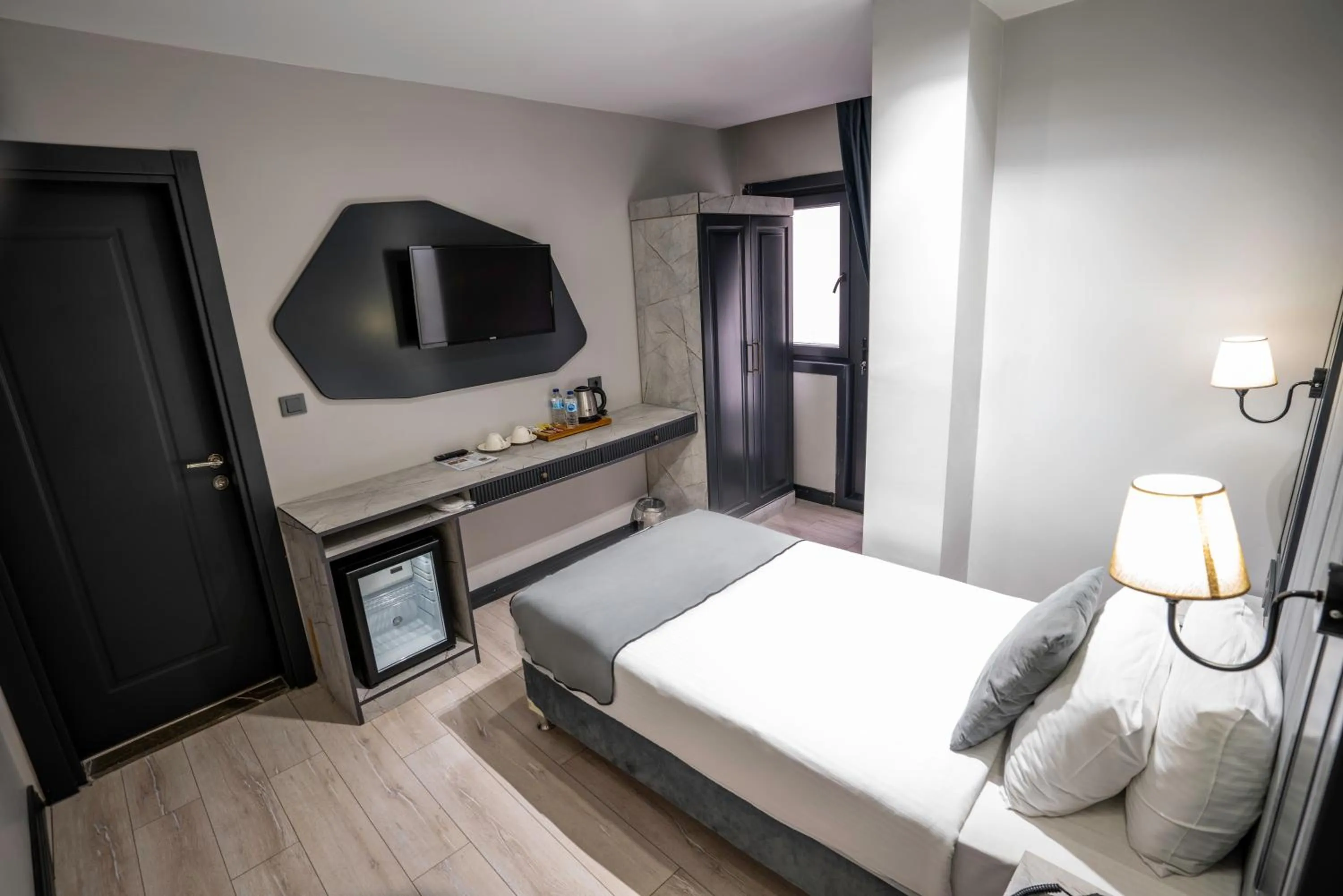 Bed in Express Plus Hotel