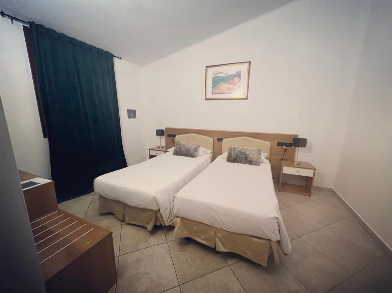 Bed in Hotel Le Corti