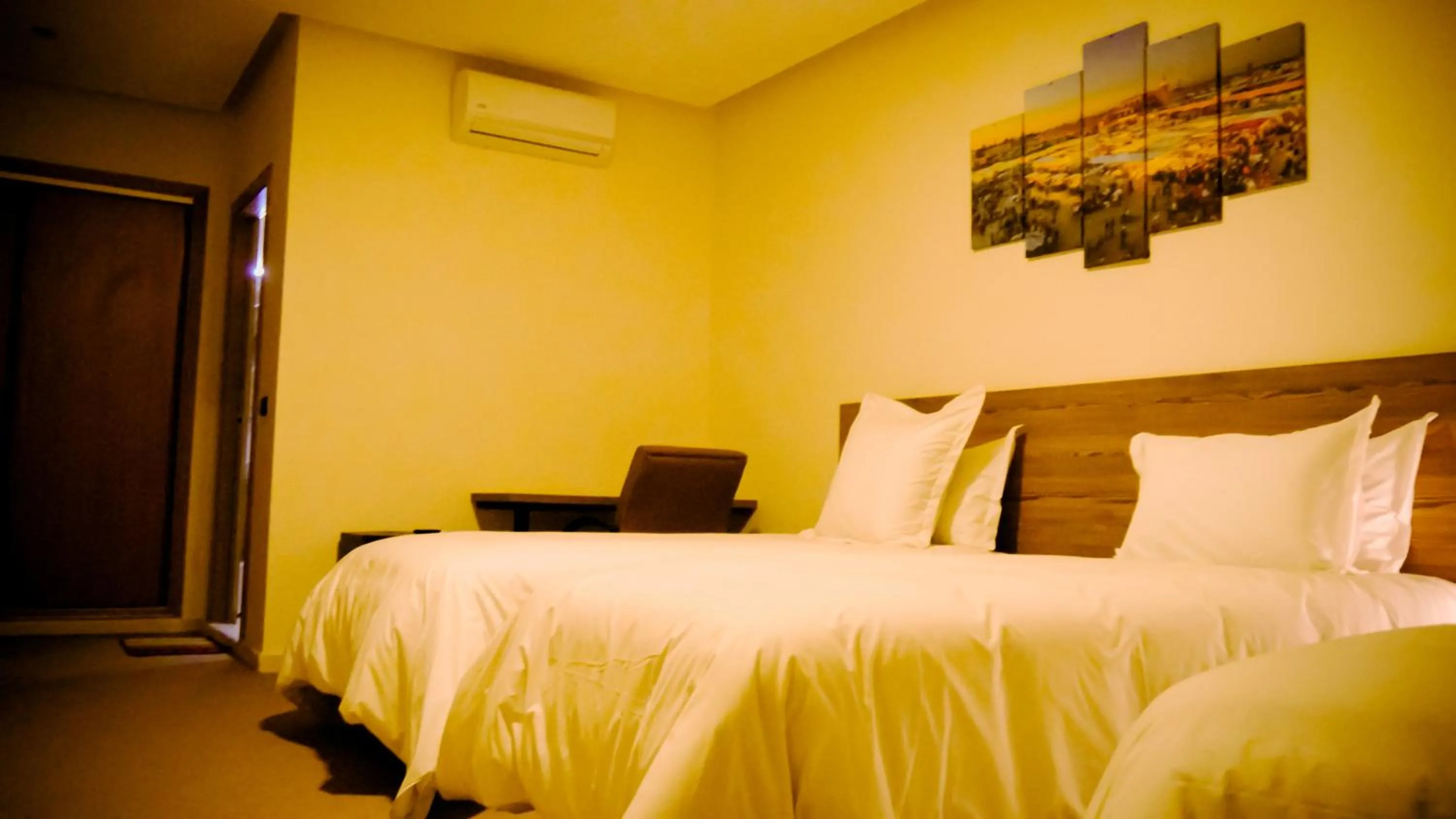 Bed in EL MOUSSAFIR HOTEL