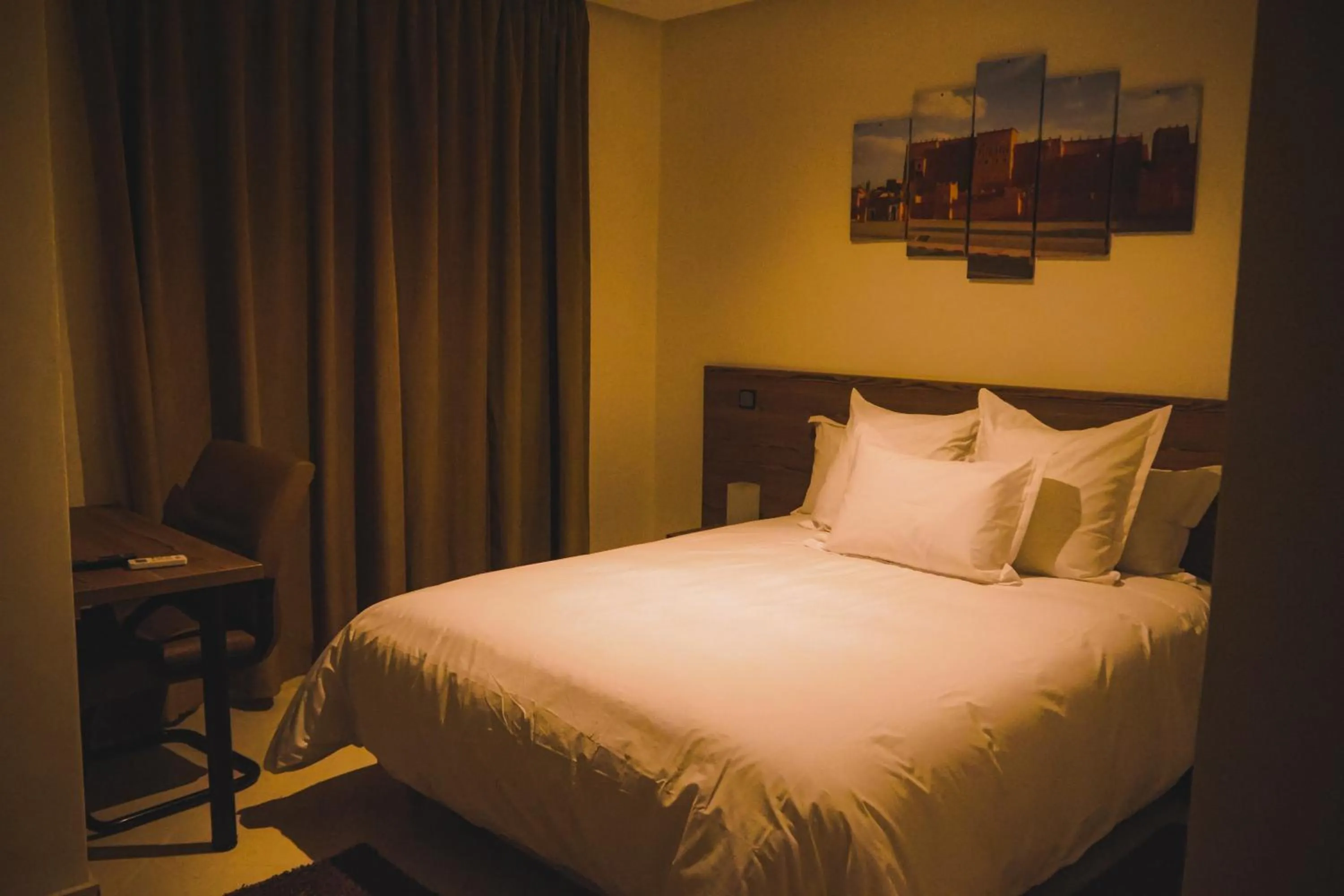 Bed in EL MOUSSAFIR HOTEL