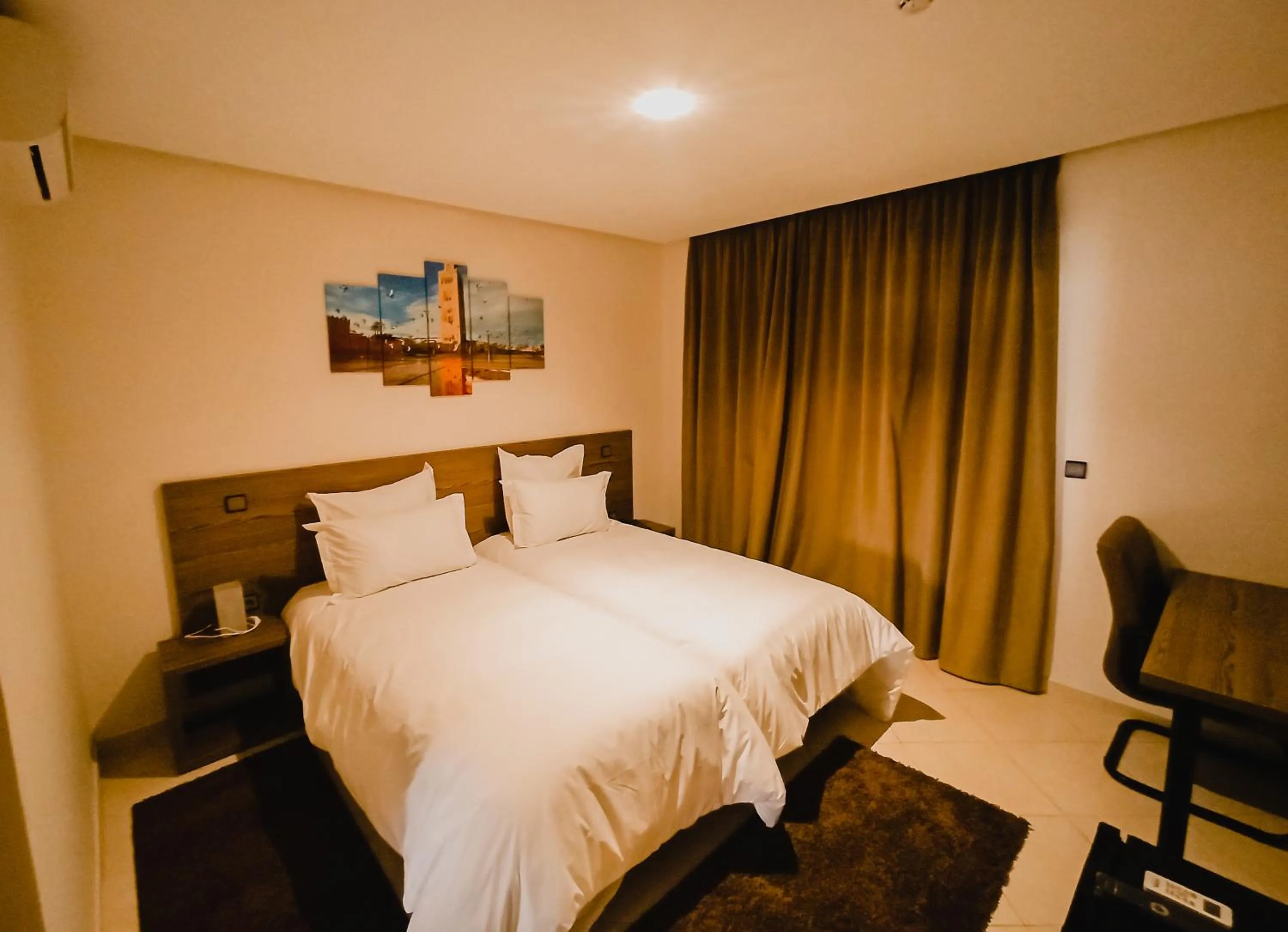 Bed in EL MOUSSAFIR HOTEL