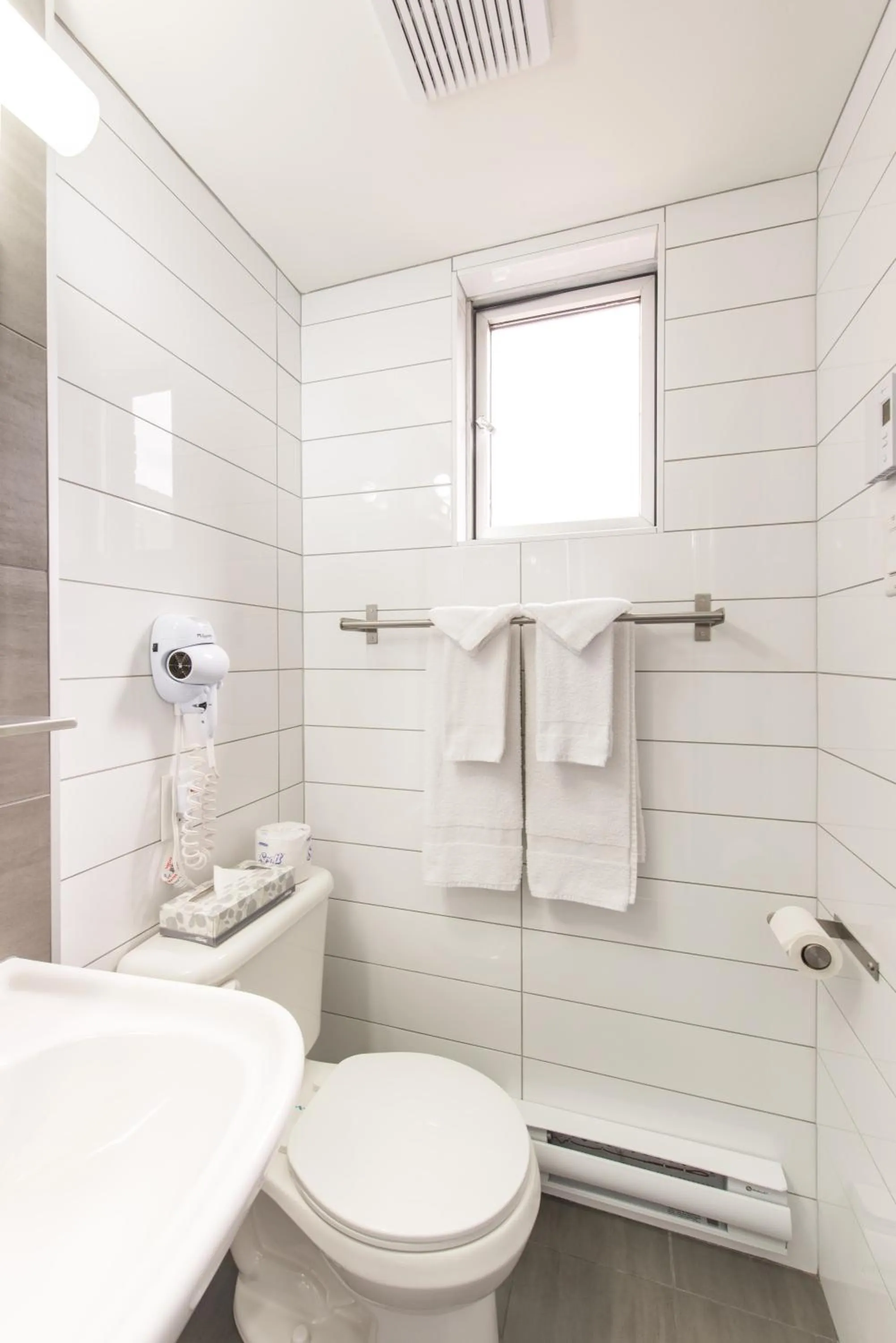 Bathroom in Travelodge by Wyndham Montreal Centre