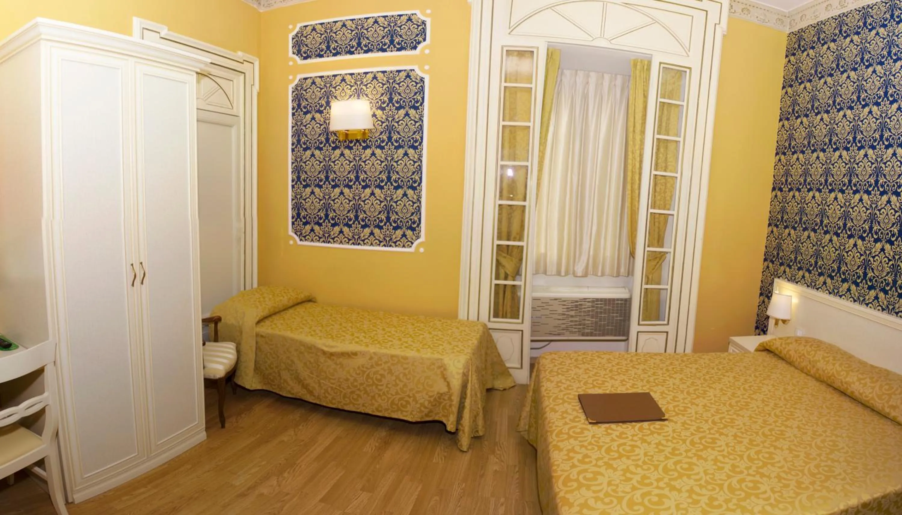 Bed in DG Prestige Room