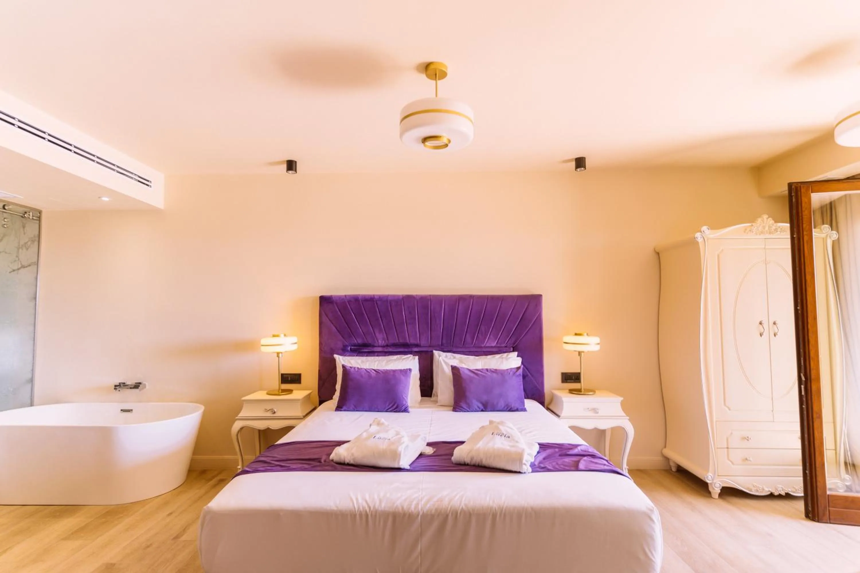 Bed in Santa Lucia Boutique Hotel