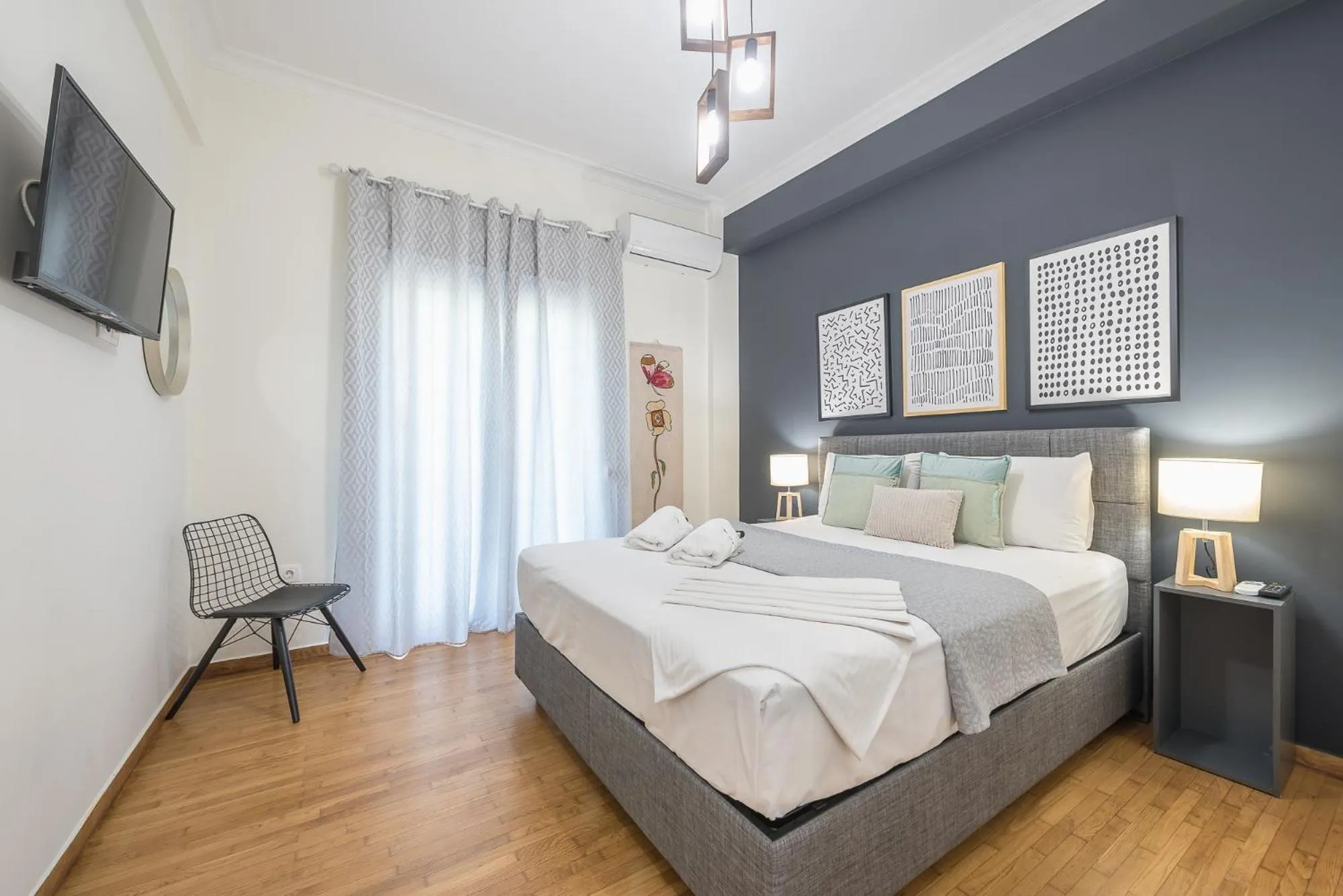 Bed in Elegant Suite by CloudKeys