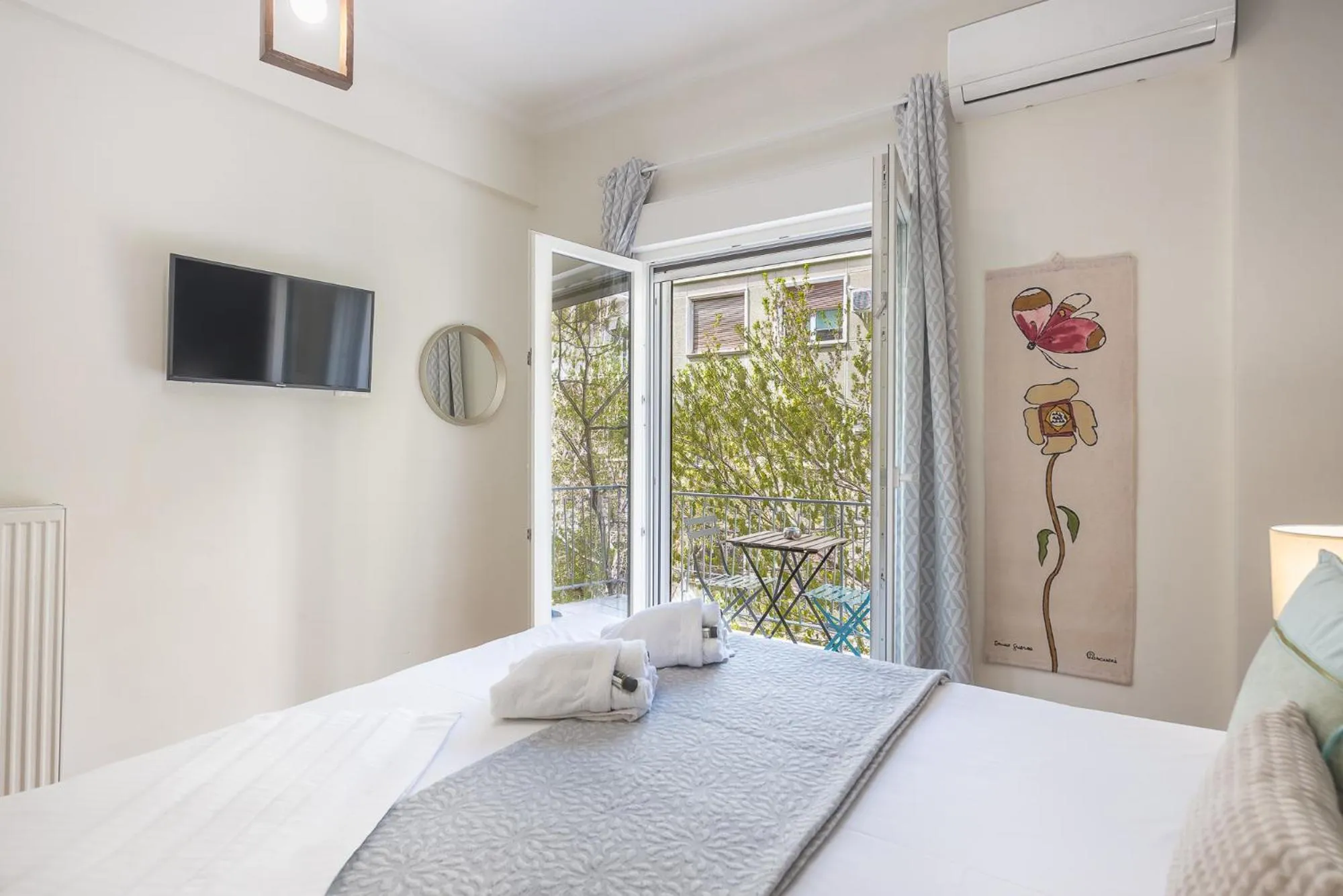 Bed in Elegant Suite by CloudKeys