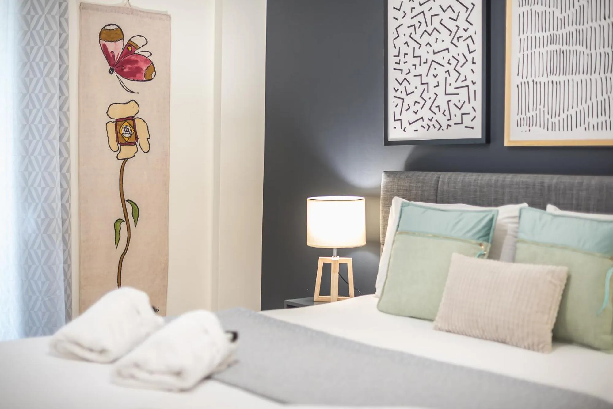 Bed in Elegant Suite by CloudKeys