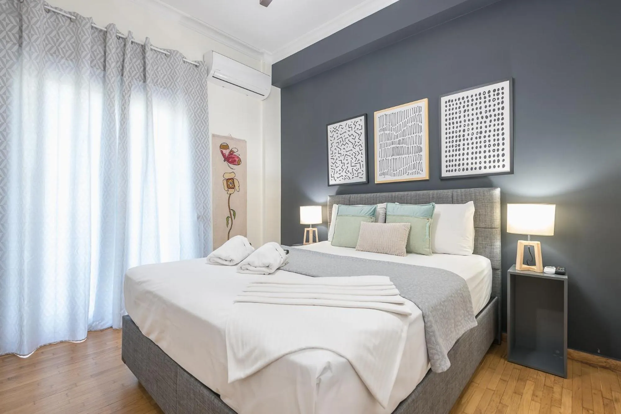 Bed in Elegant Suite by CloudKeys