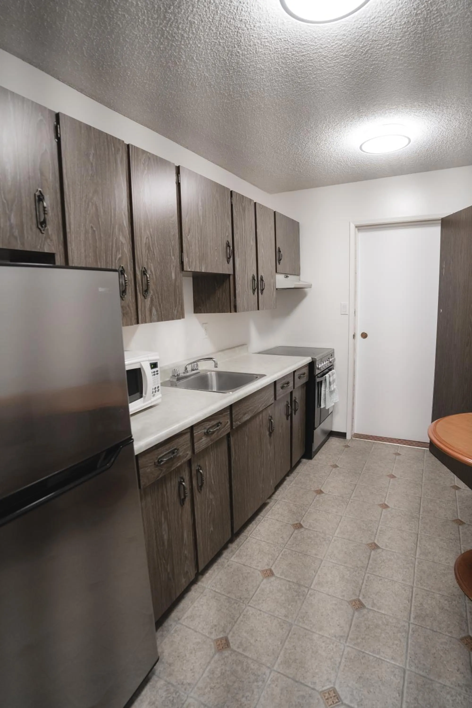 Kitchen or kitchenette in Robin Hood Inn and Suites