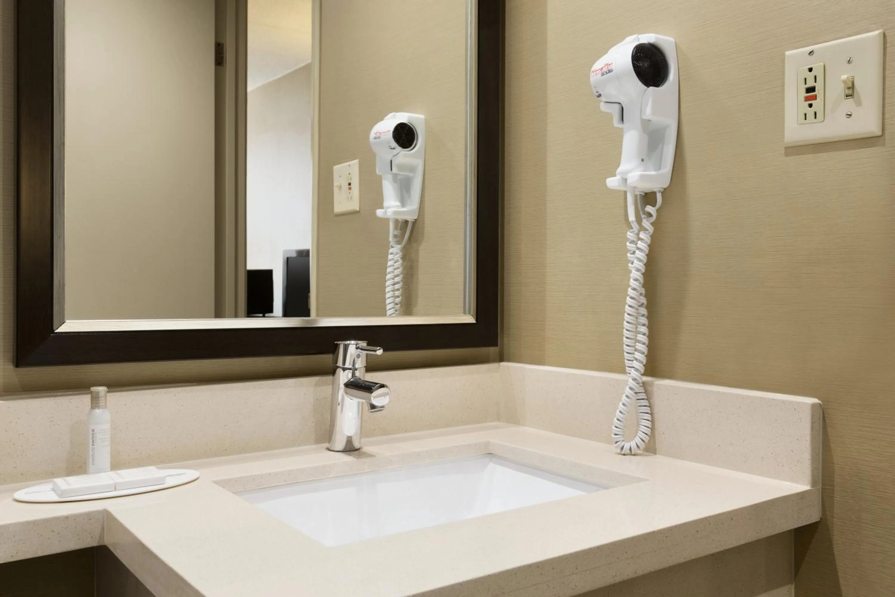 Bathroom in Travelodge by Wyndham Toronto East