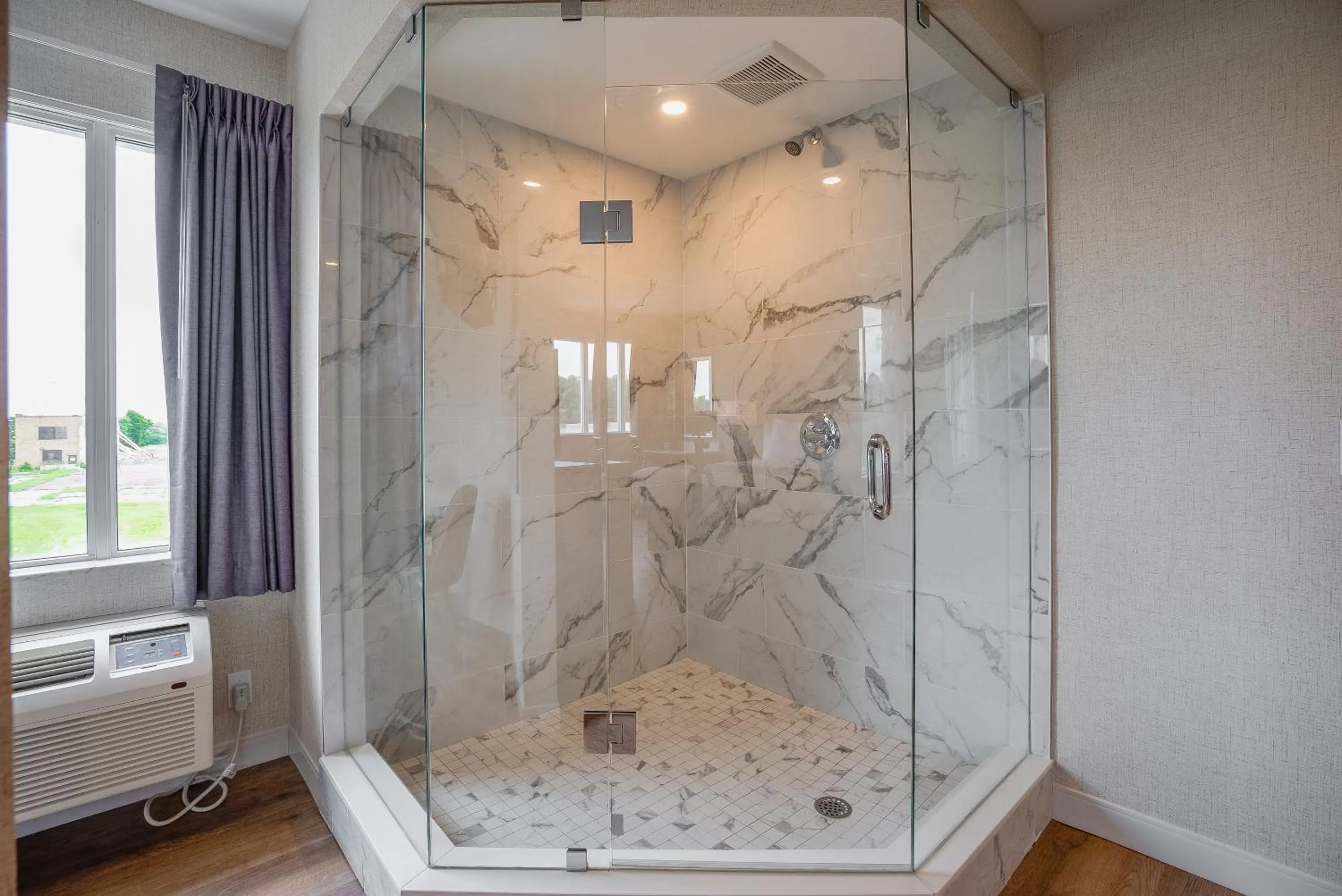 Shower in Monte Carlo Inn Oakville Suites