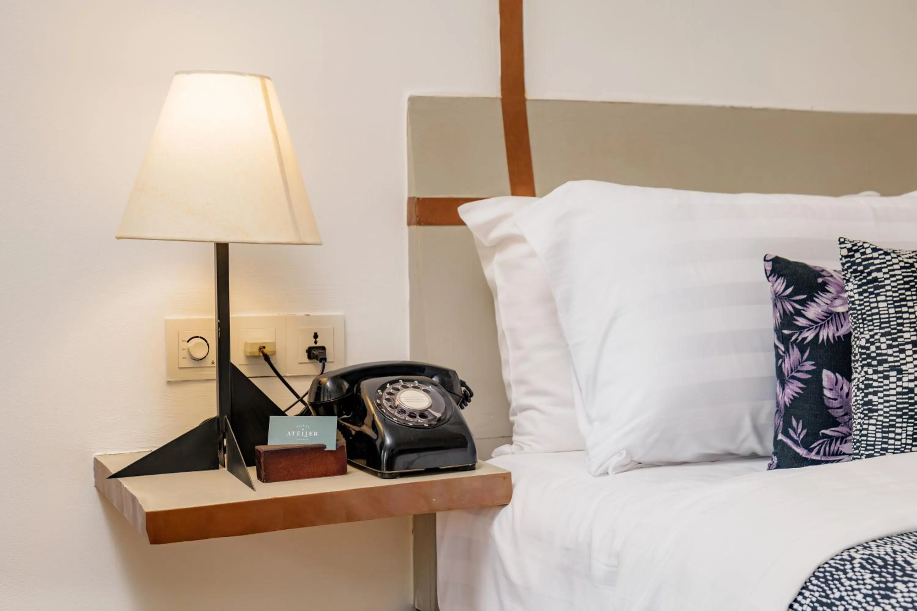 Bed in Atelier Hotel