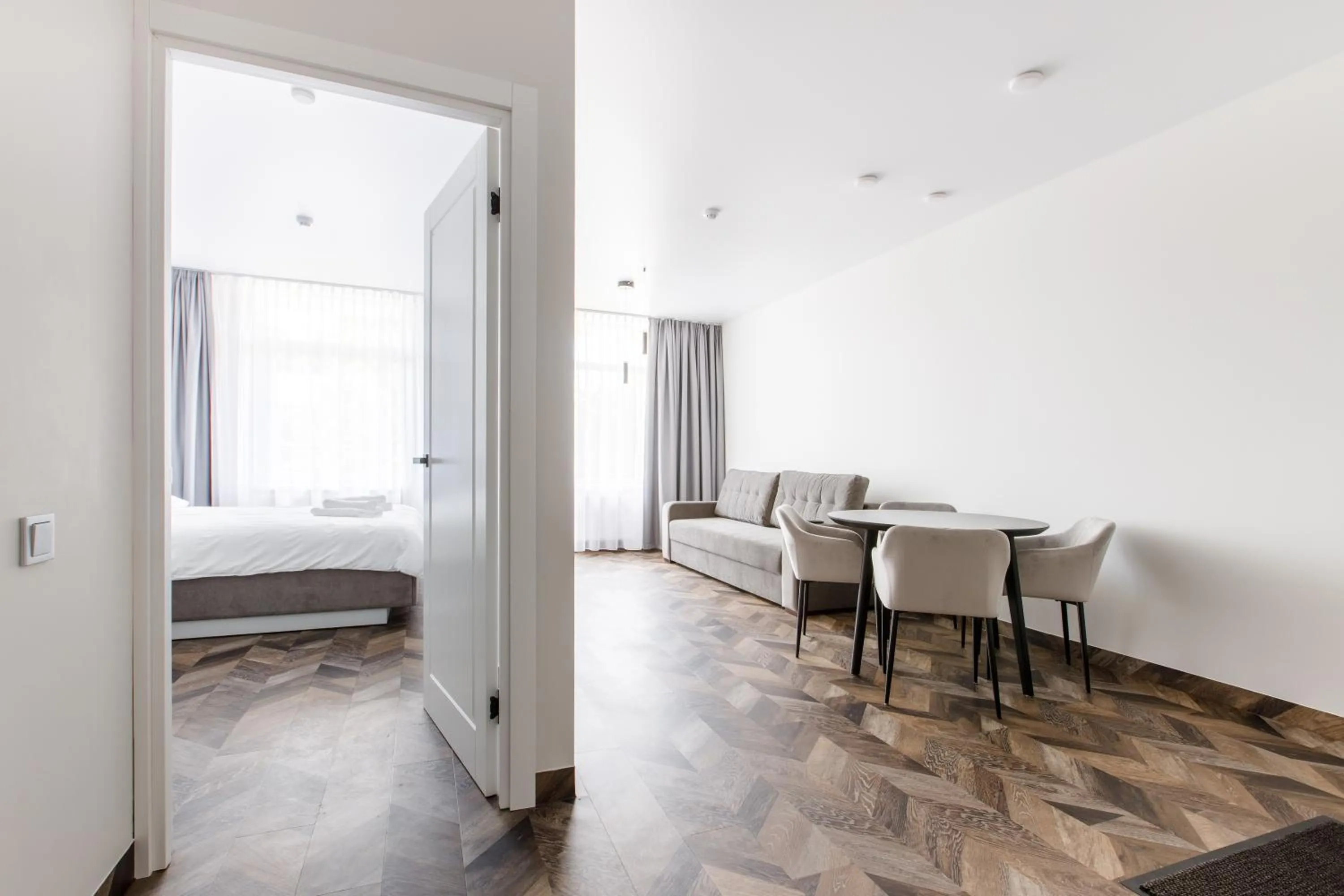 Living room, Bed in Seaside Central Hotel