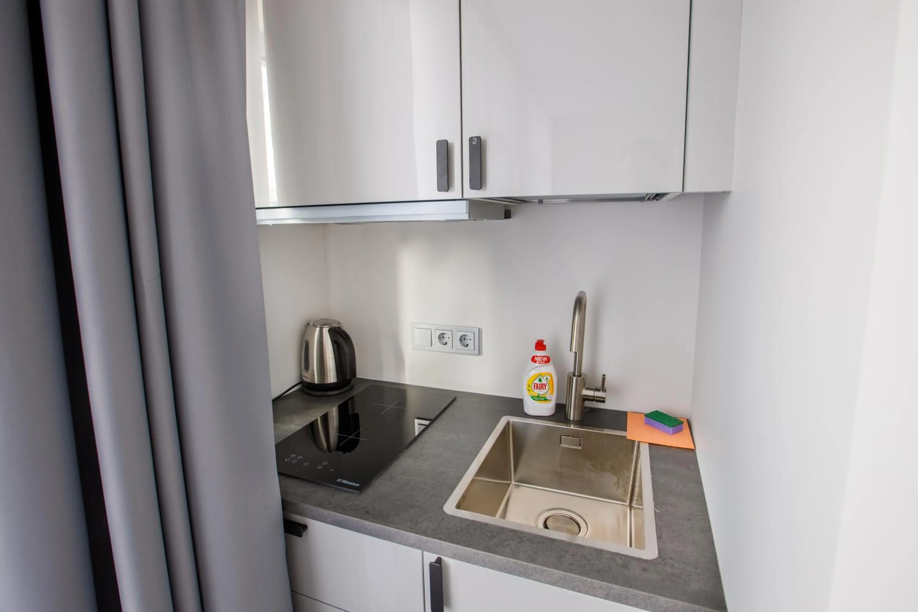 Kitchen or kitchenette in Seaside Central Hotel