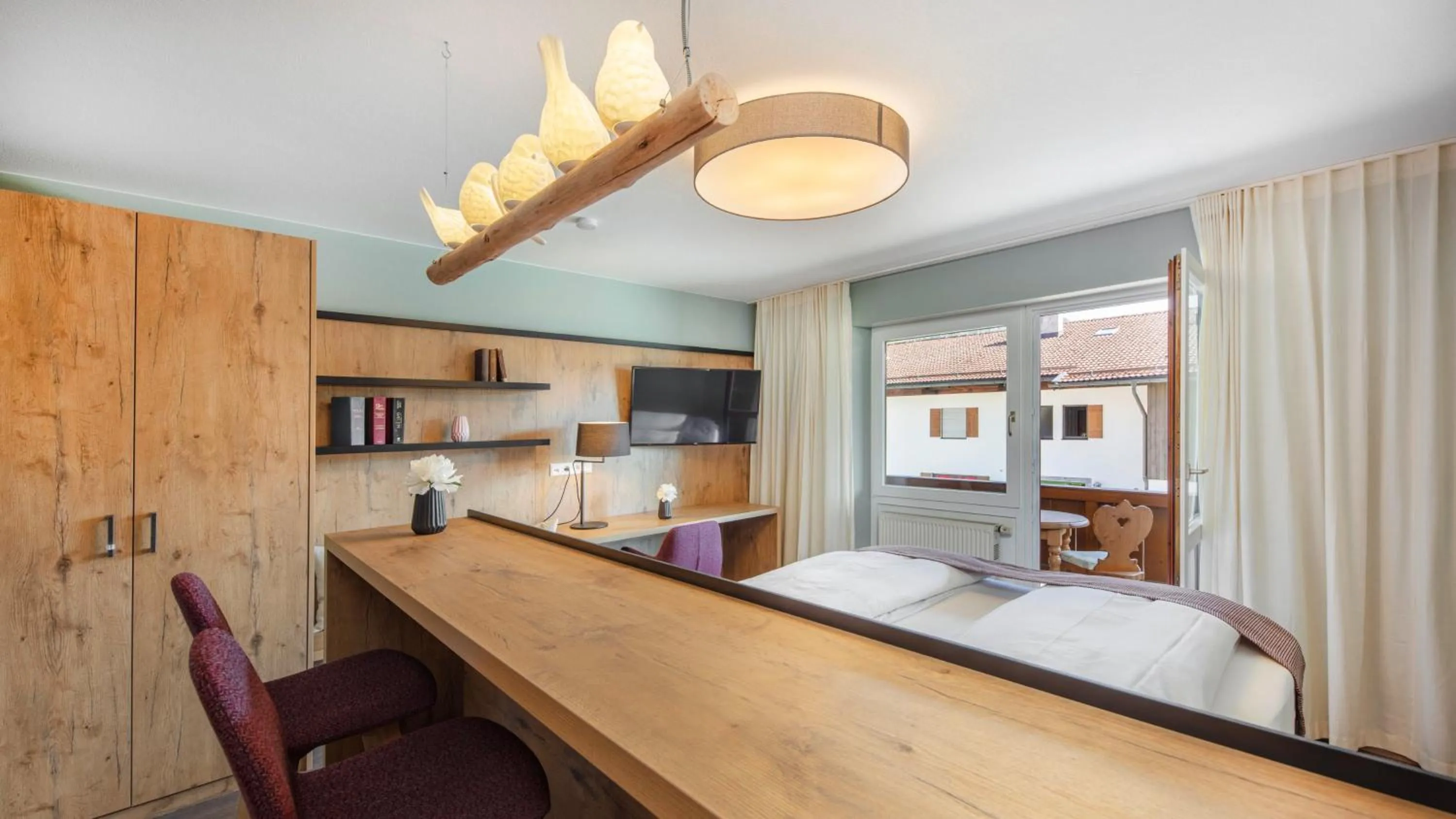 Photo of the whole room, Bed in Aparthotel Chiemgaufuchs - CHIEMGAUKARTE