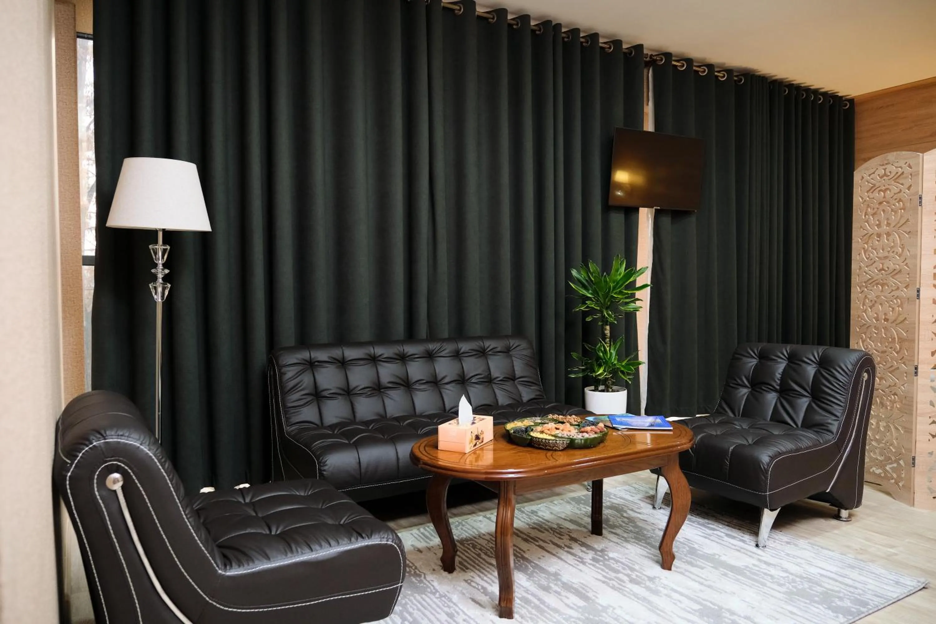 Seating area in Central Palace Halal Hotel