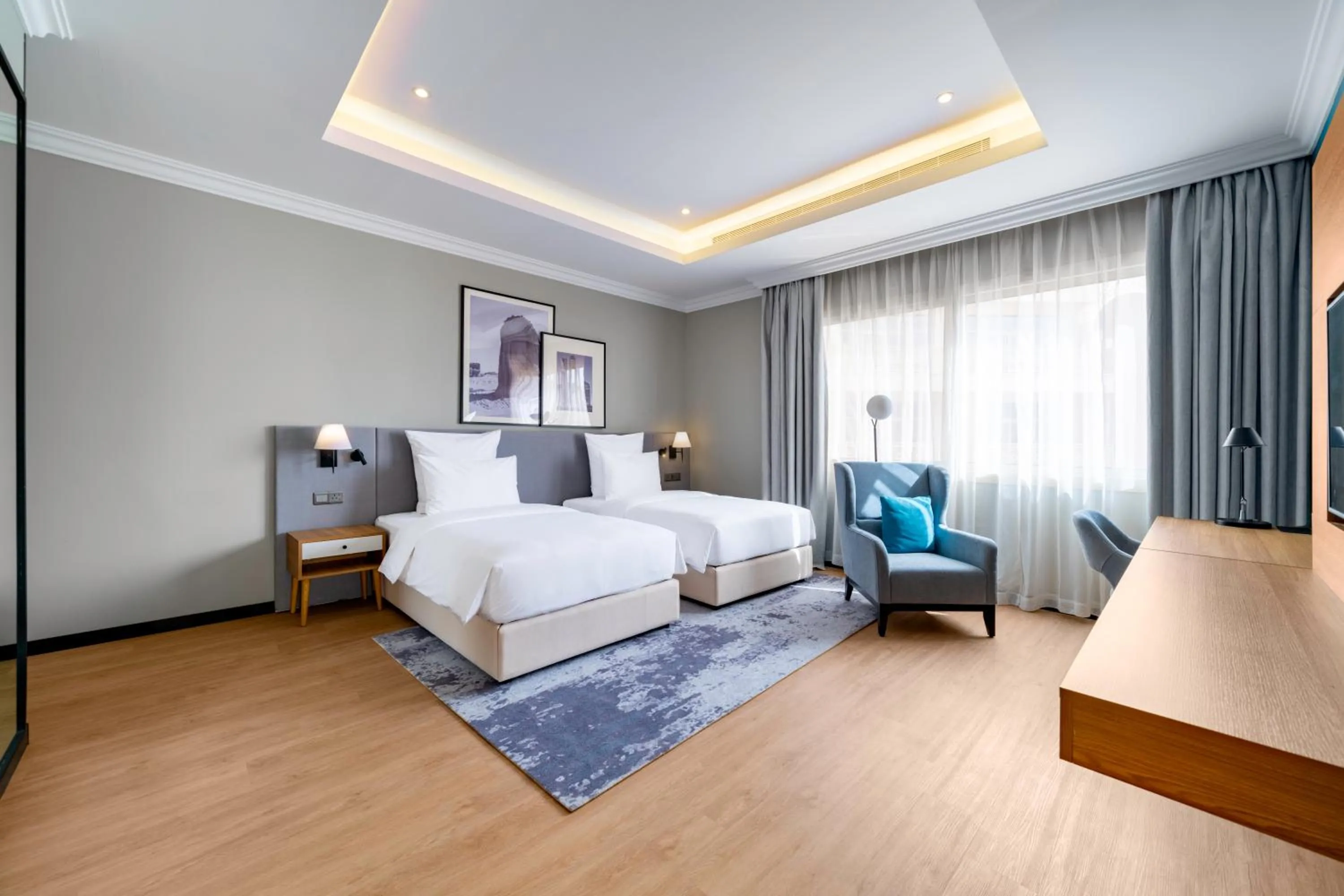 Photo of the whole room, Bed in Radisson Hotel Riyadh Airport