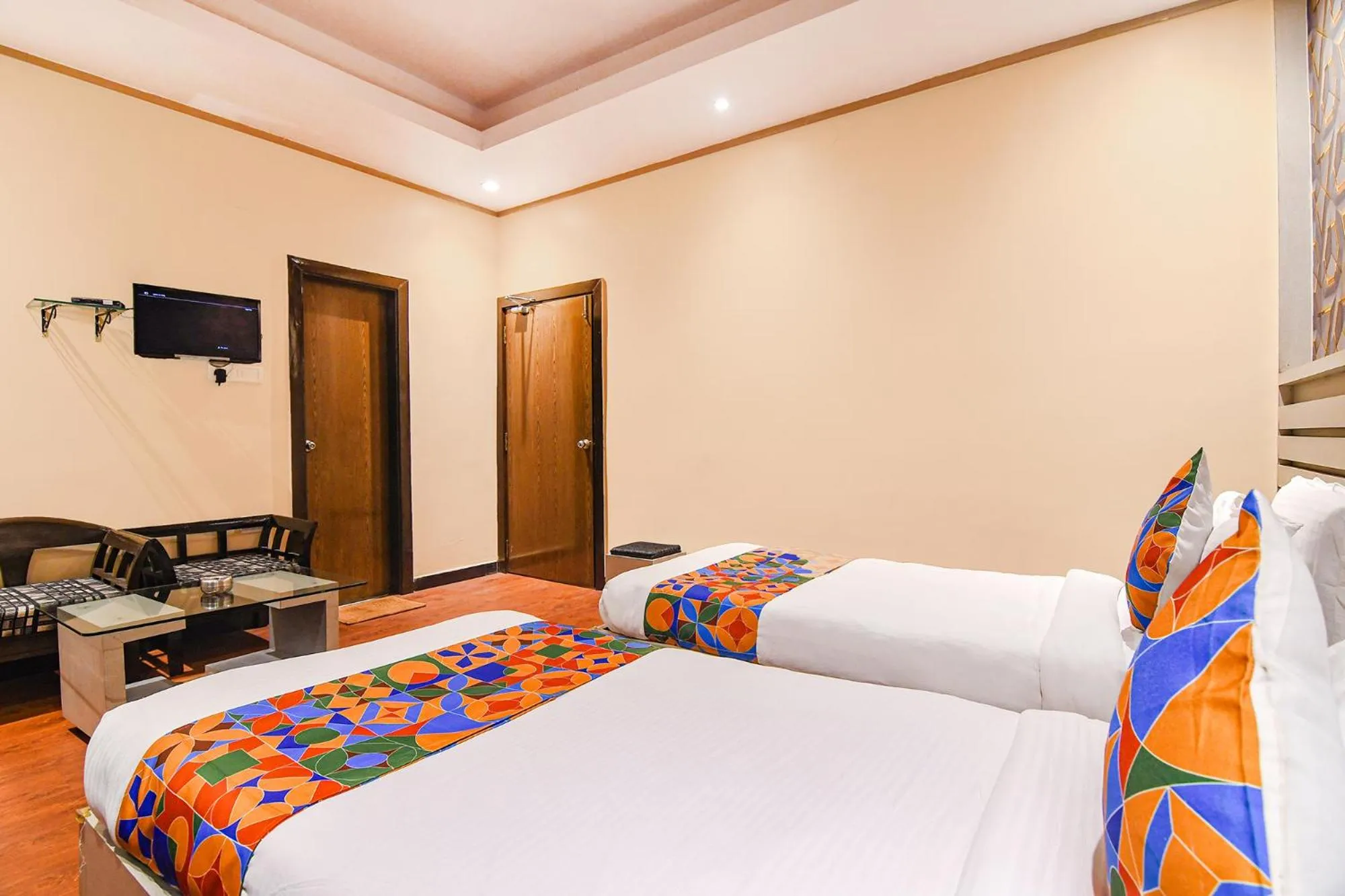 Bed in FabHotel Shivani International