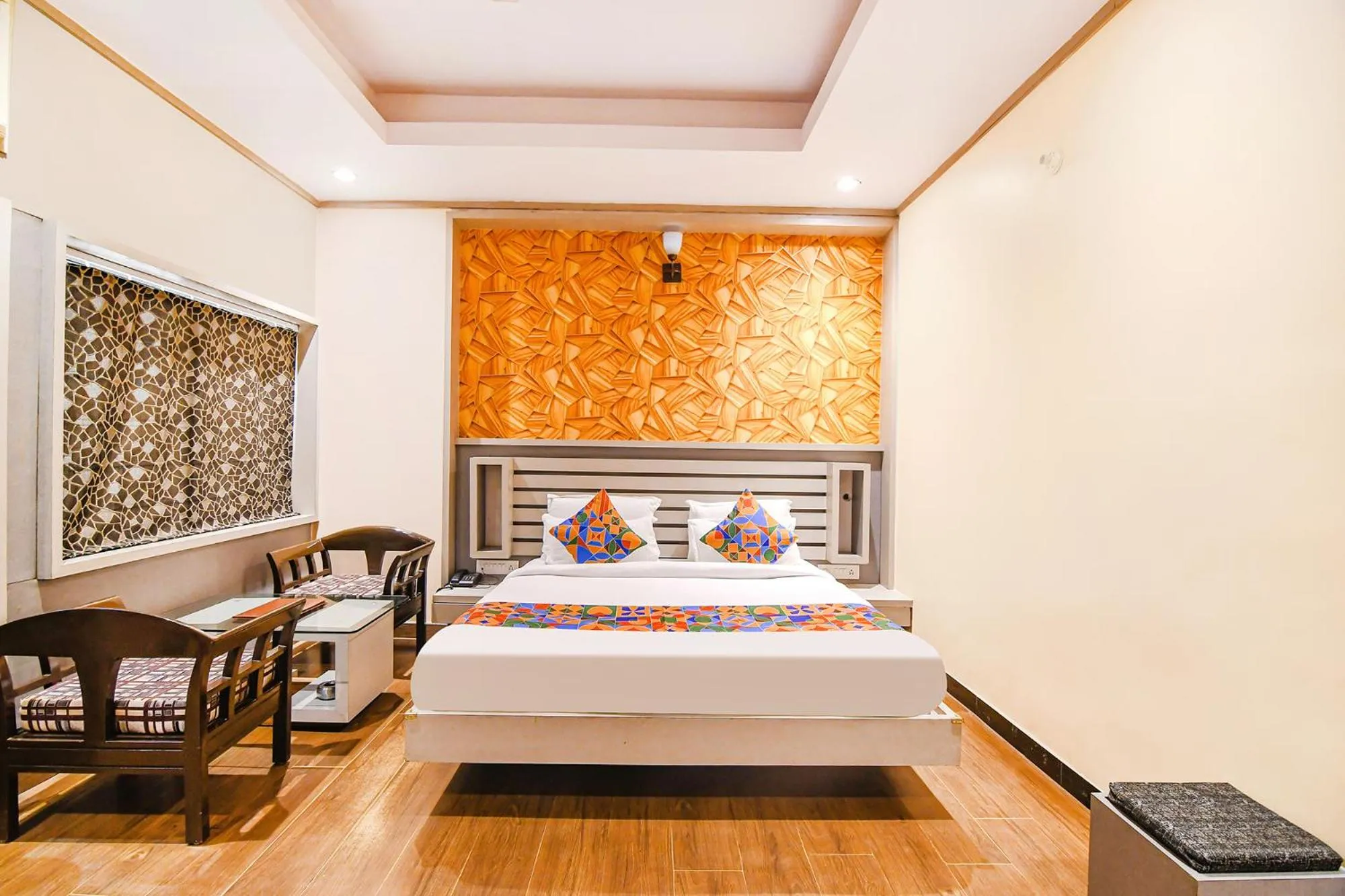 Bed in FabHotel Shivani International