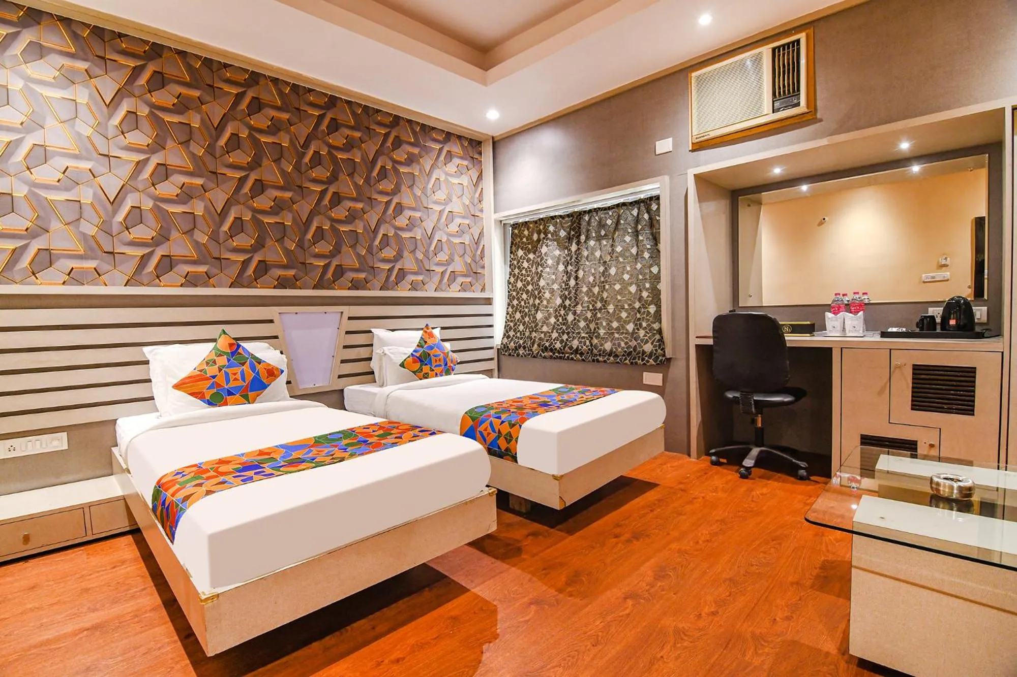 Bed in FabHotel Shivani International
