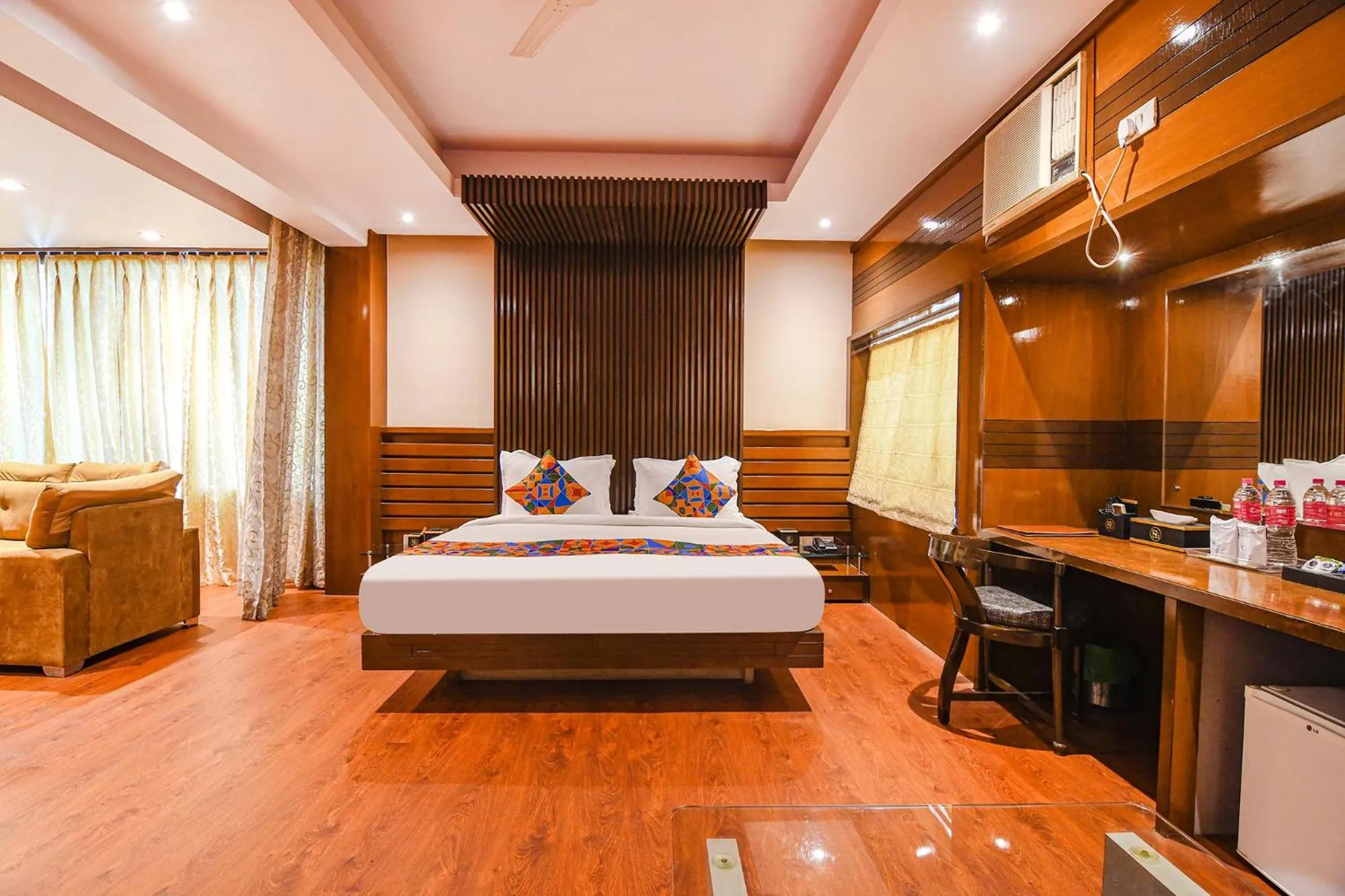 Bed in FabHotel Shivani International