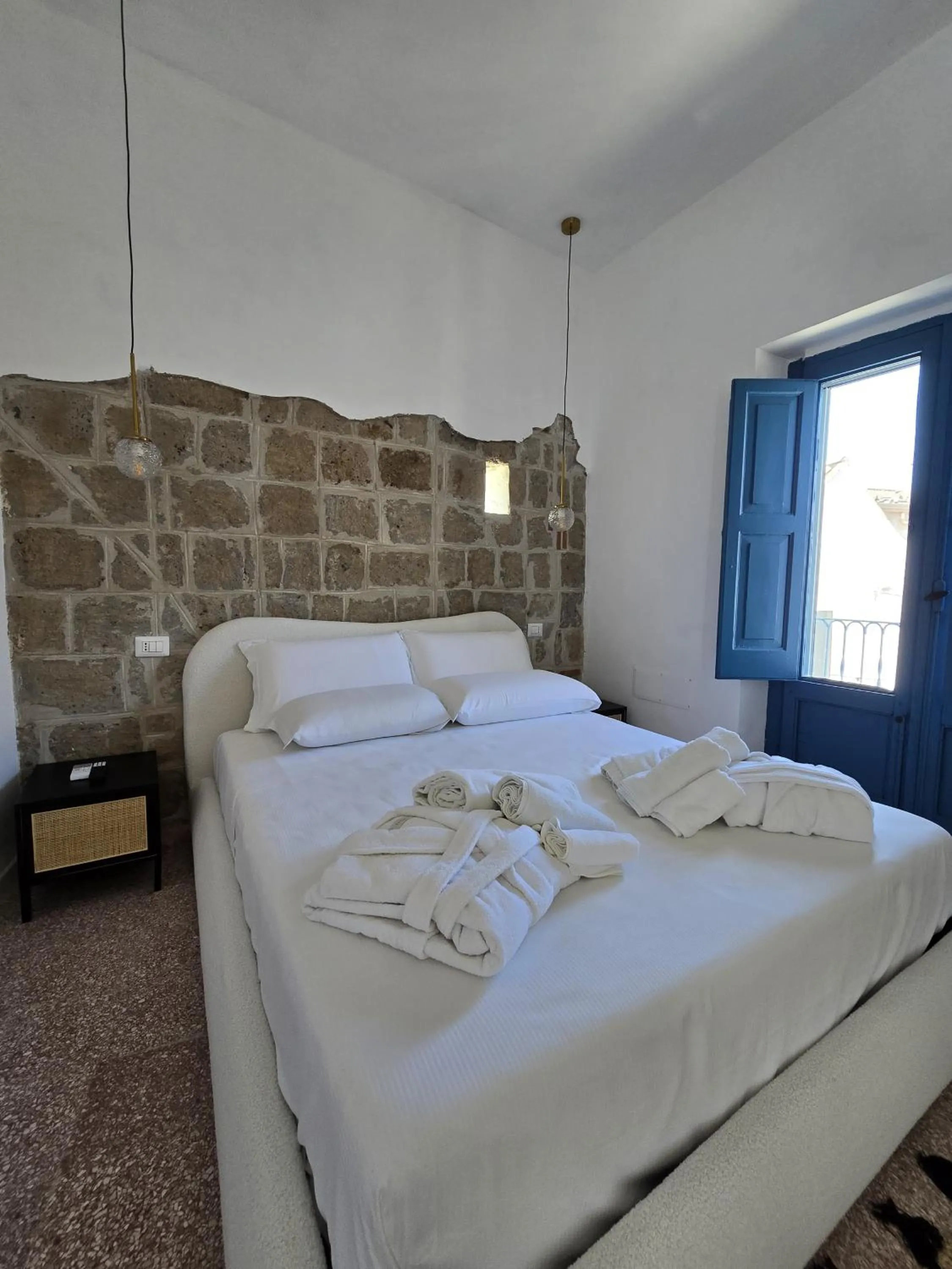 Bed in Terra Muronis Hotel Diffuso