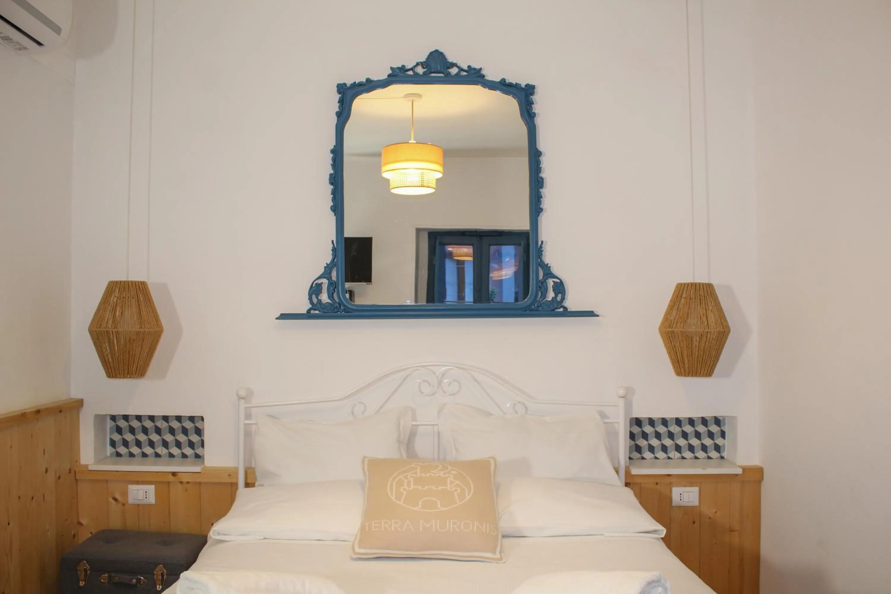 Bed in Terra Muronis Hotel Diffuso